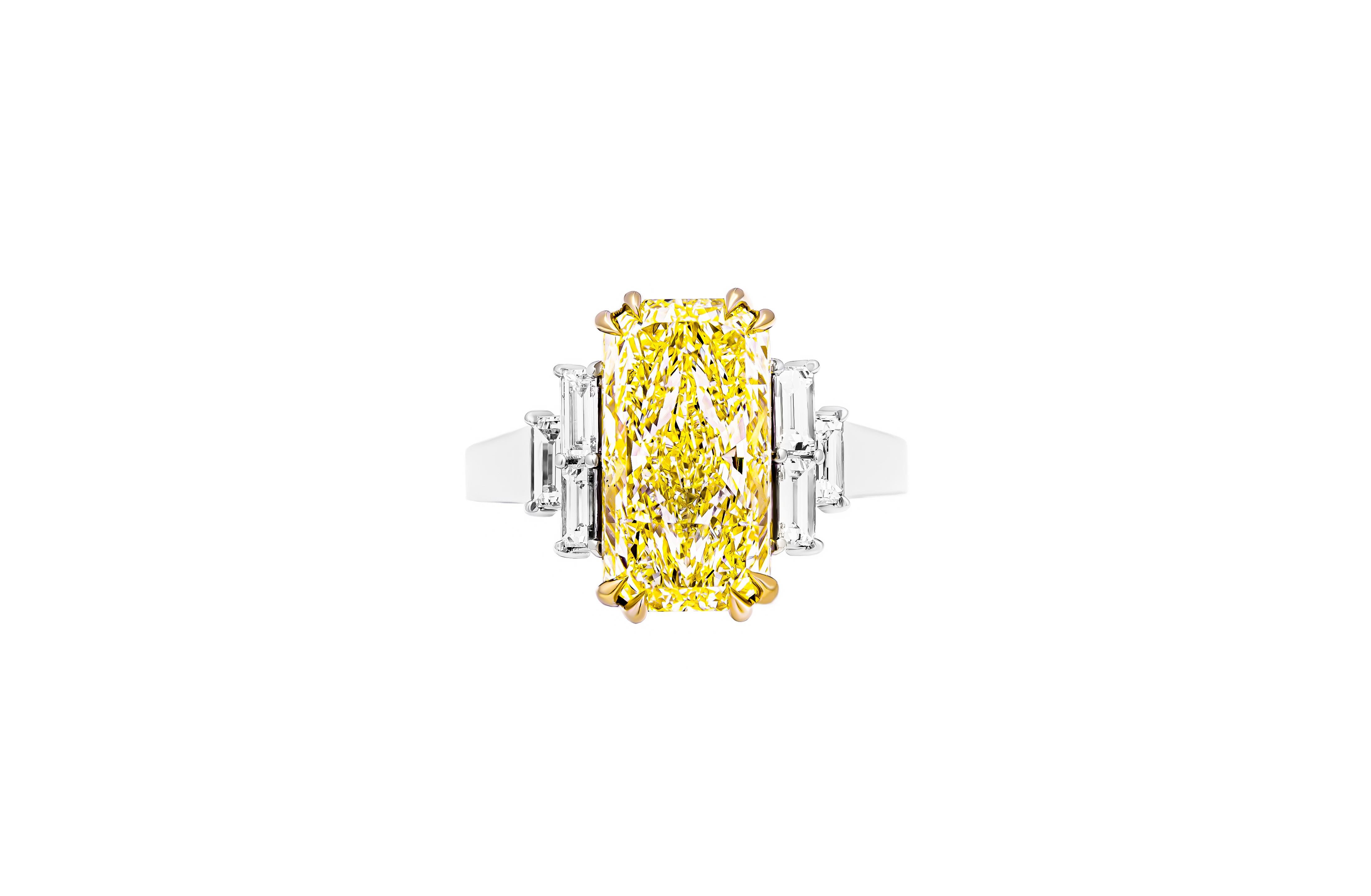 Introducing a truly exquisite and timeless masterpiece, this GIA certified 3 stone ring showcases unparalleled craftsmanship and sophistication. Crafted with precision in a luxurious blend of 950 platinum and 18k yellow gold, this ring is a stunning