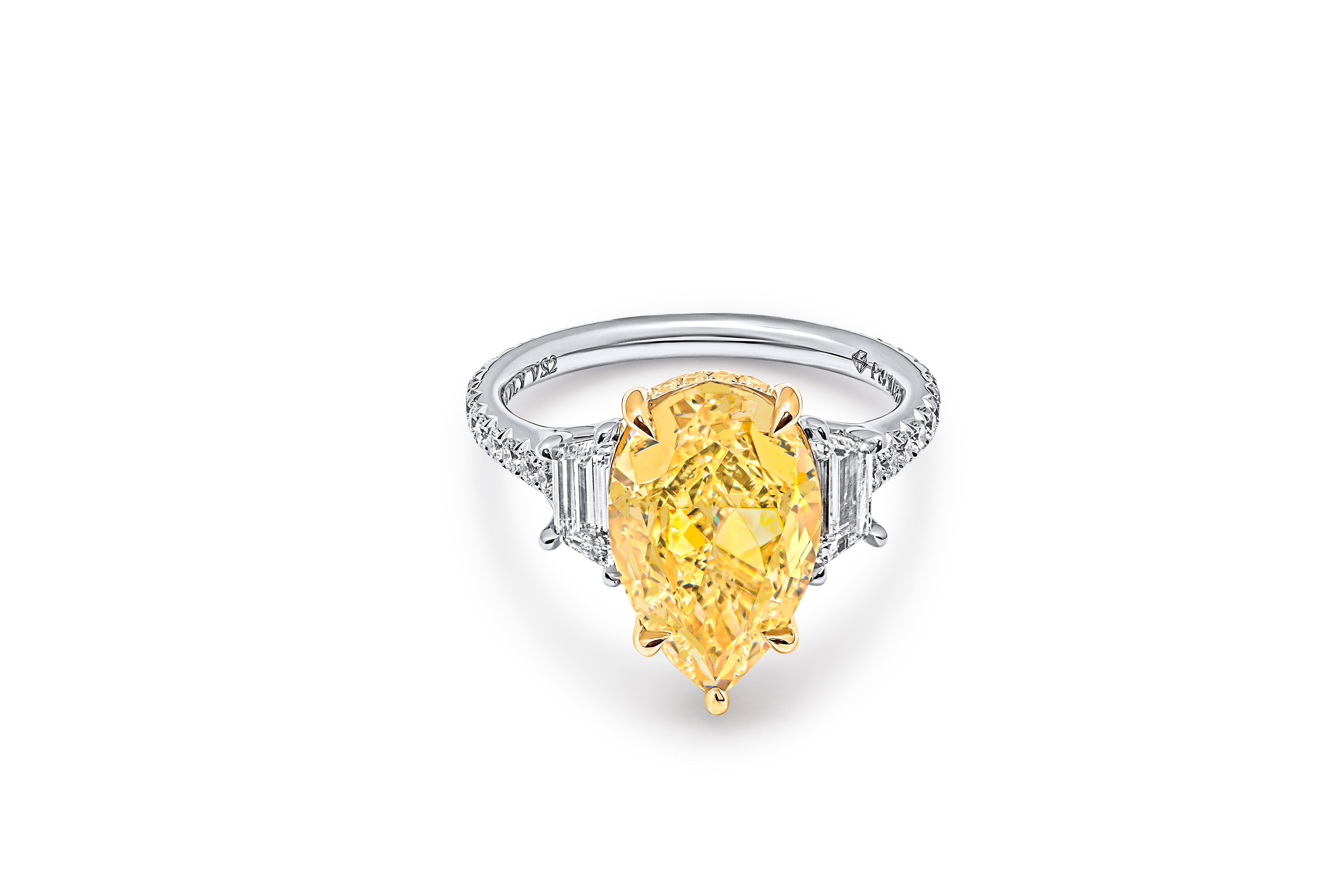 Modern GIA Certified 3 Stone Ring with 5.02ct Fancy Light Yellow Pear Shape Diamond For Sale