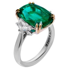 Used GIA Certified 3 stone ring with 5.03ct Green Emerald Cushion Cut