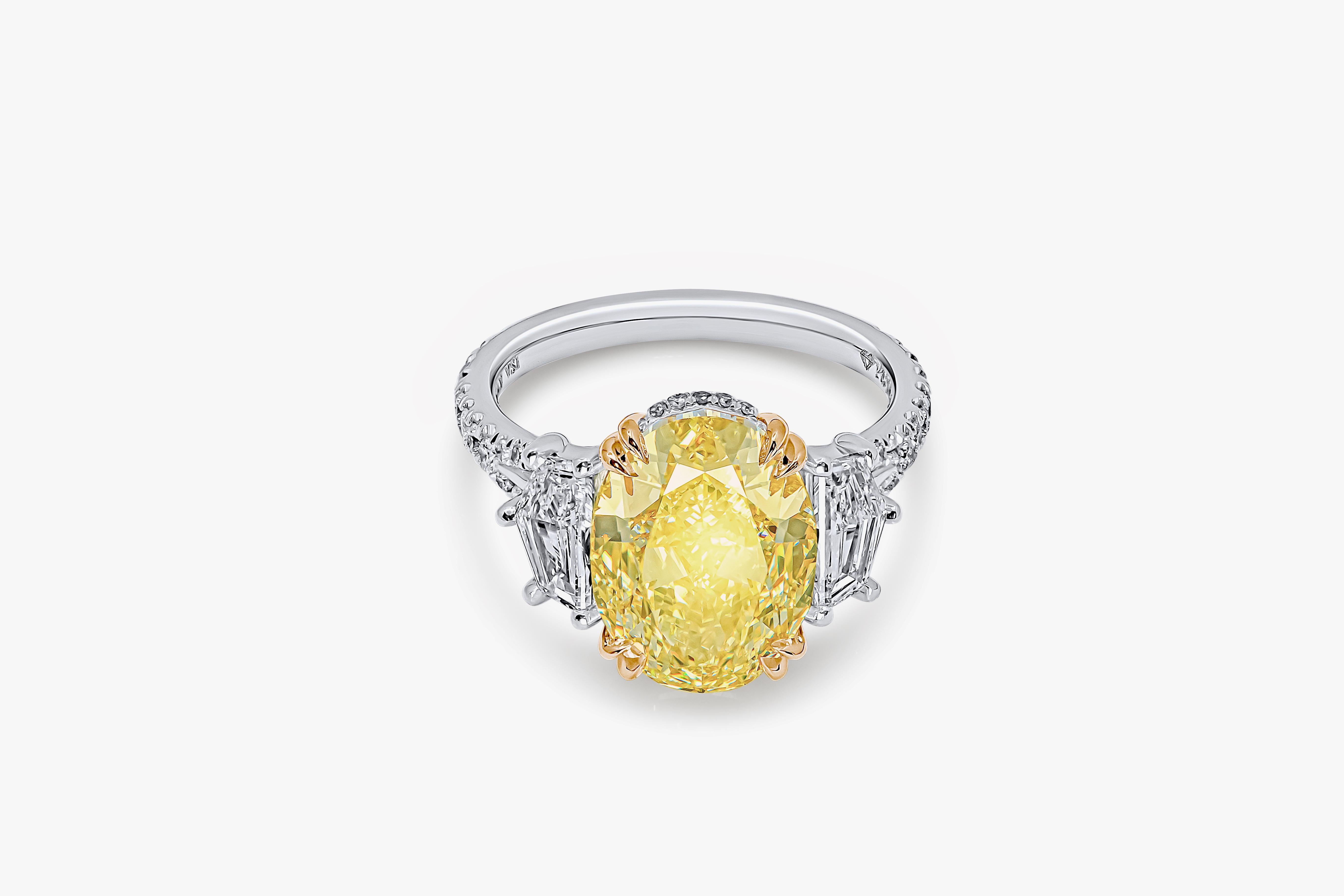 Modern GIA Certified 3 Stone Ring with 5.52ct Fancy Yellow  VS1  Oval Diamond
