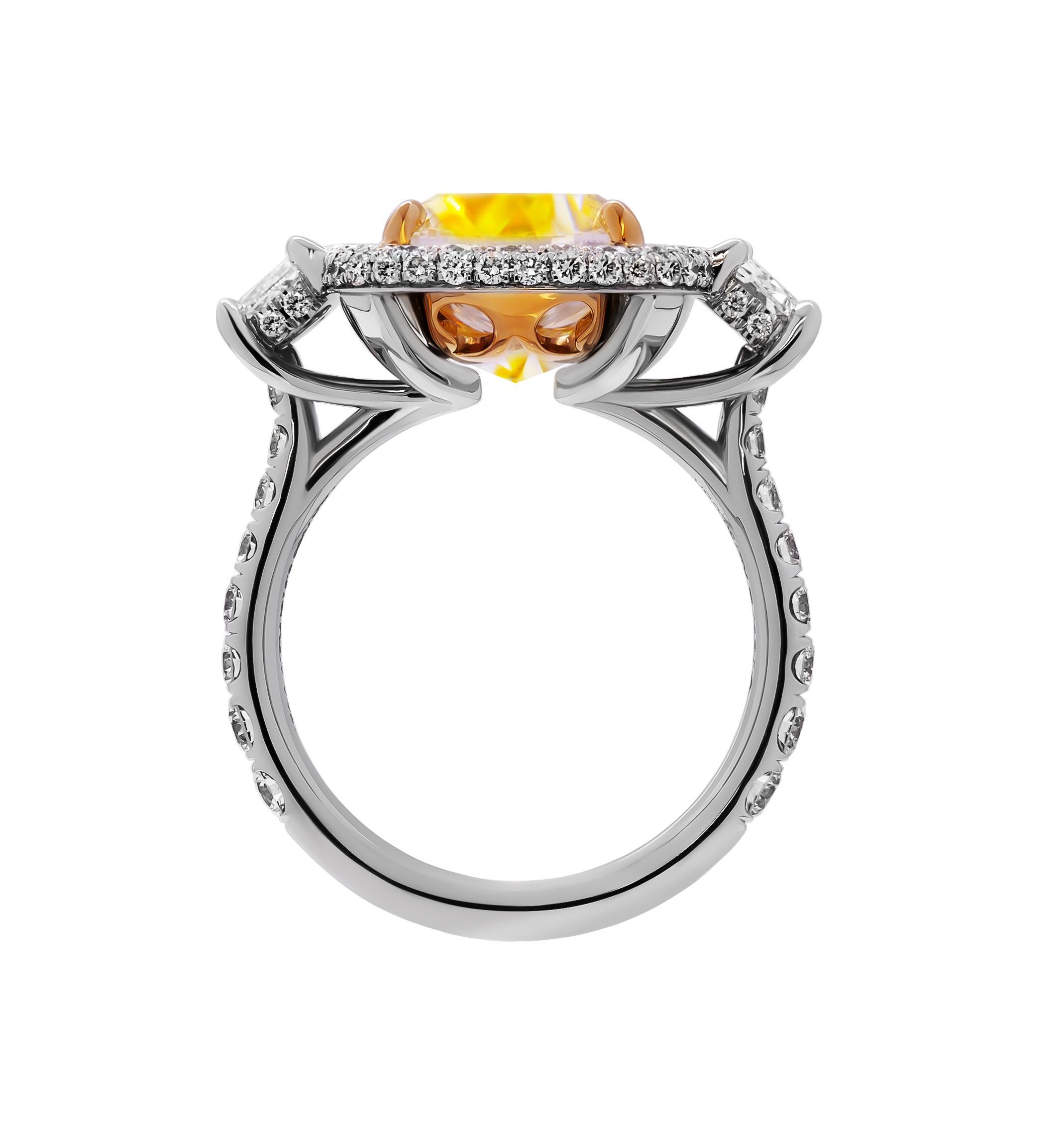 GIA Certified 3 stone ring with 6.31ct Fancy Light Yellow Cushion Cut Diamond In New Condition For Sale In New York, NY