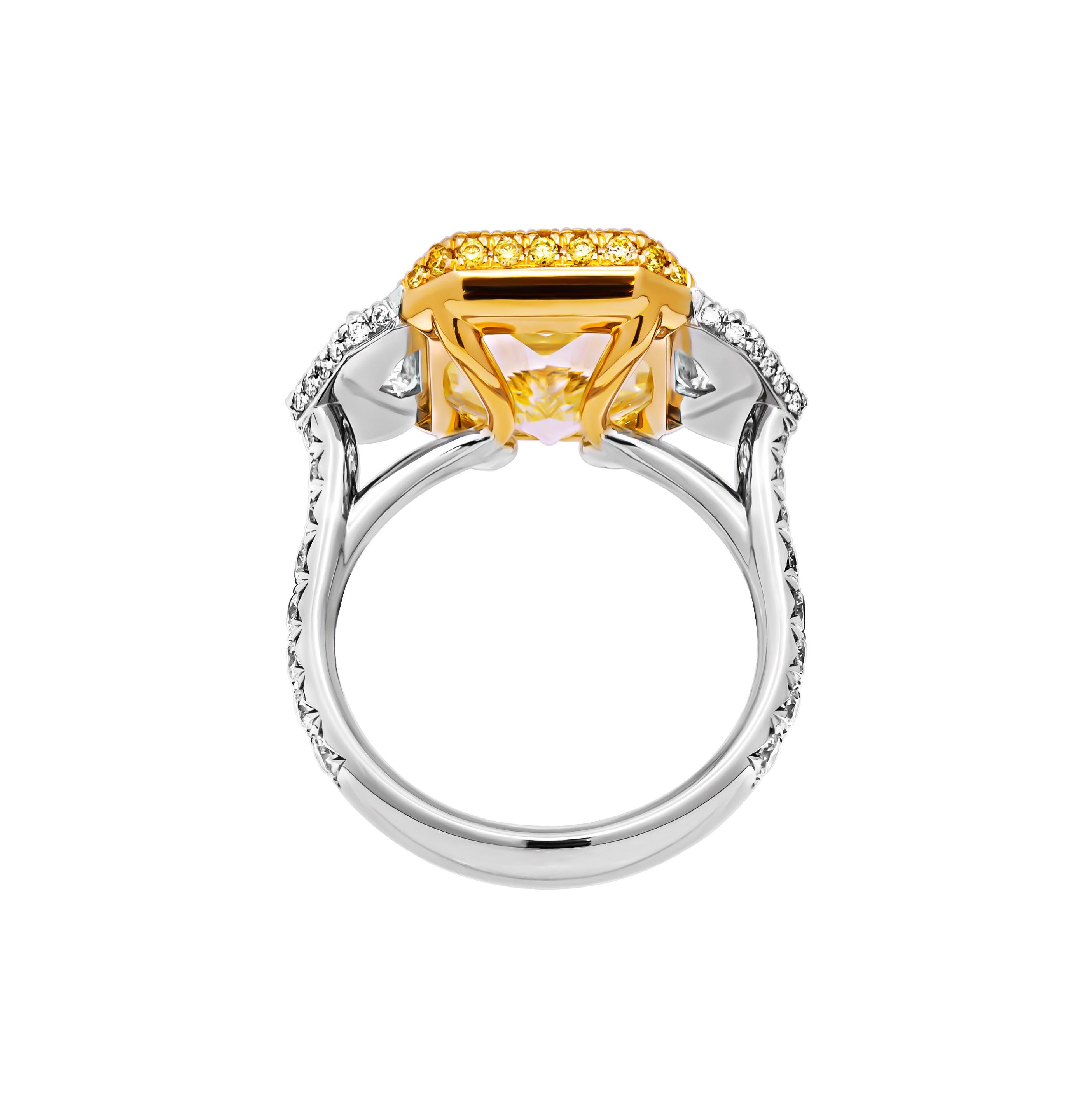 Modern GIA Certified 3 stone ring with 7.06ct Fancy Light Yellow Radiant Cut Diamond For Sale