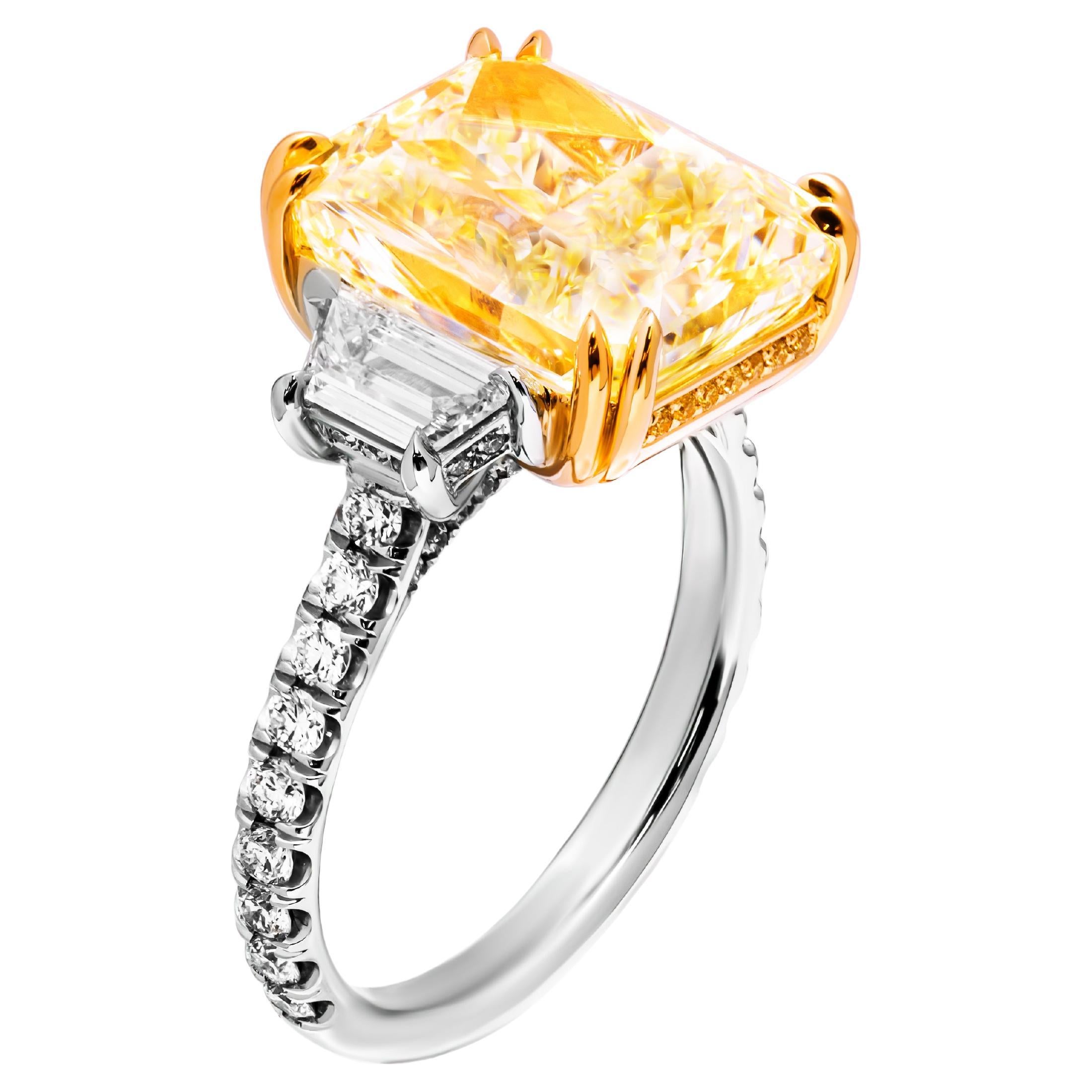 GIA Certified 3 stone ring with 8.02ct Fancy Light Yellow Radiant Cut Diamond For Sale