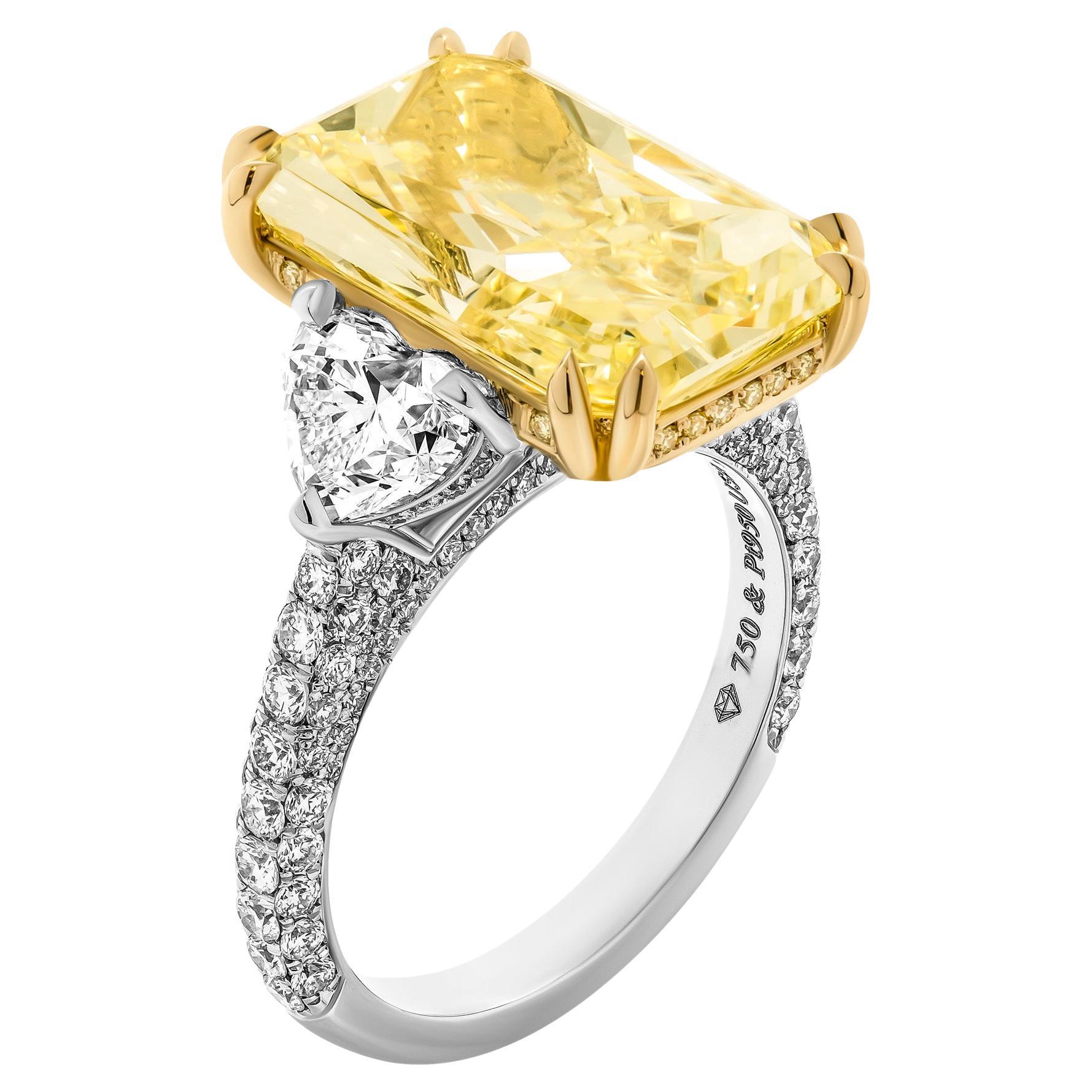 GIA Certified 3 Stone Ring with 8.10ct Fancy Yellow Radiant Cut Diamond