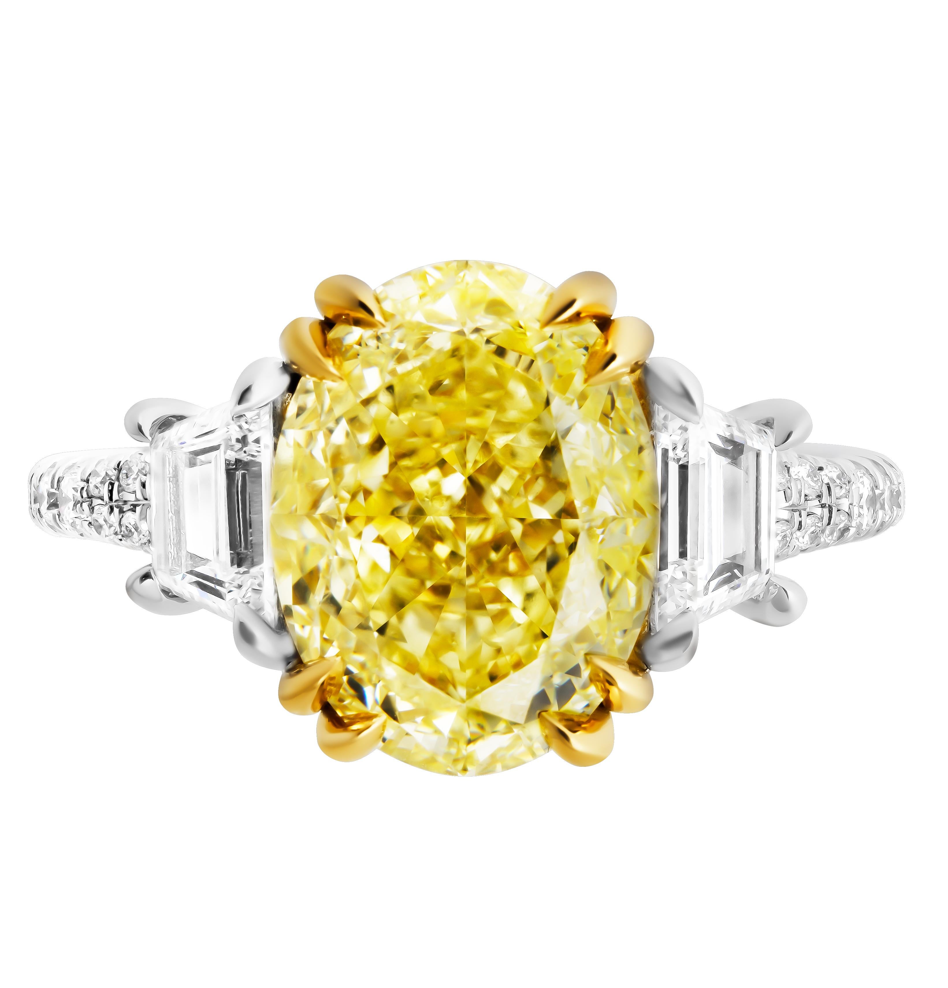 Modern GIA Certified 3 Stone Ring with Fancy Light Yellow Oval Diamond For Sale