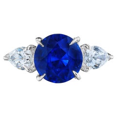 GIA Certified 3.04 Carat Round Blue Sapphire and Diamond Three-Stone Ring