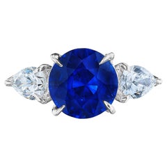 Auction - GIA Certified 3.04 Carat Round Blue Sapphire and Diamond Ring