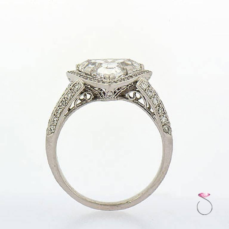 GIA Certified 3.00 Carat E, VS1 Trilliant Center in Diamond Halo Platinum Ring In Excellent Condition In Honolulu, HI