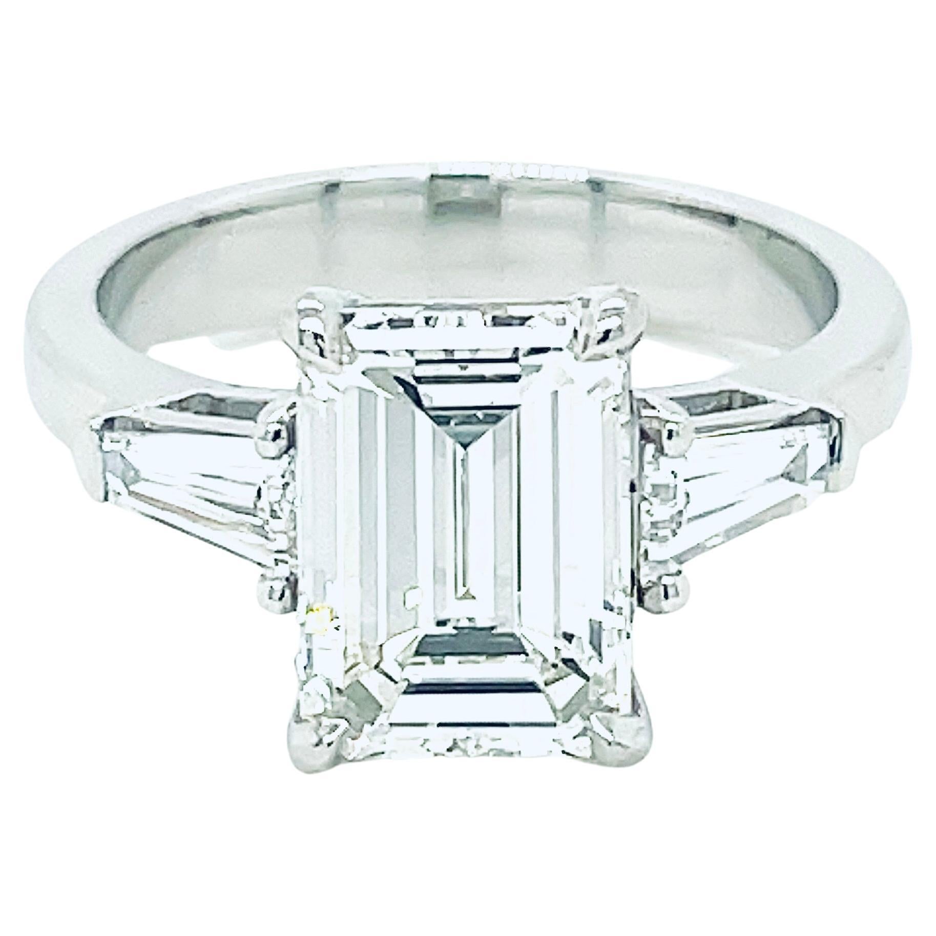 GIA Certified 3.00 Carat Emerald Cut Three-Stone Ring For Sale