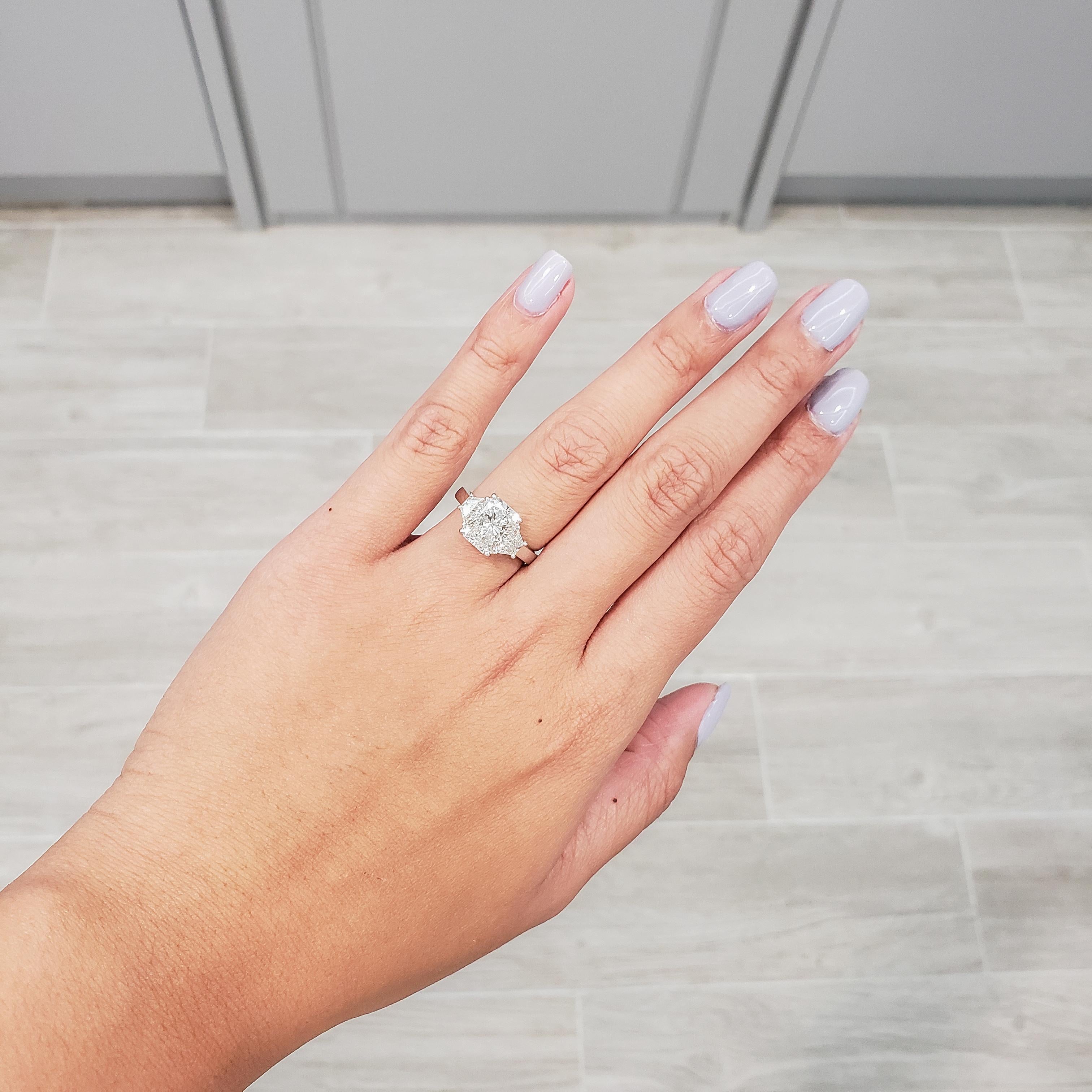 three stone radiant engagement ring