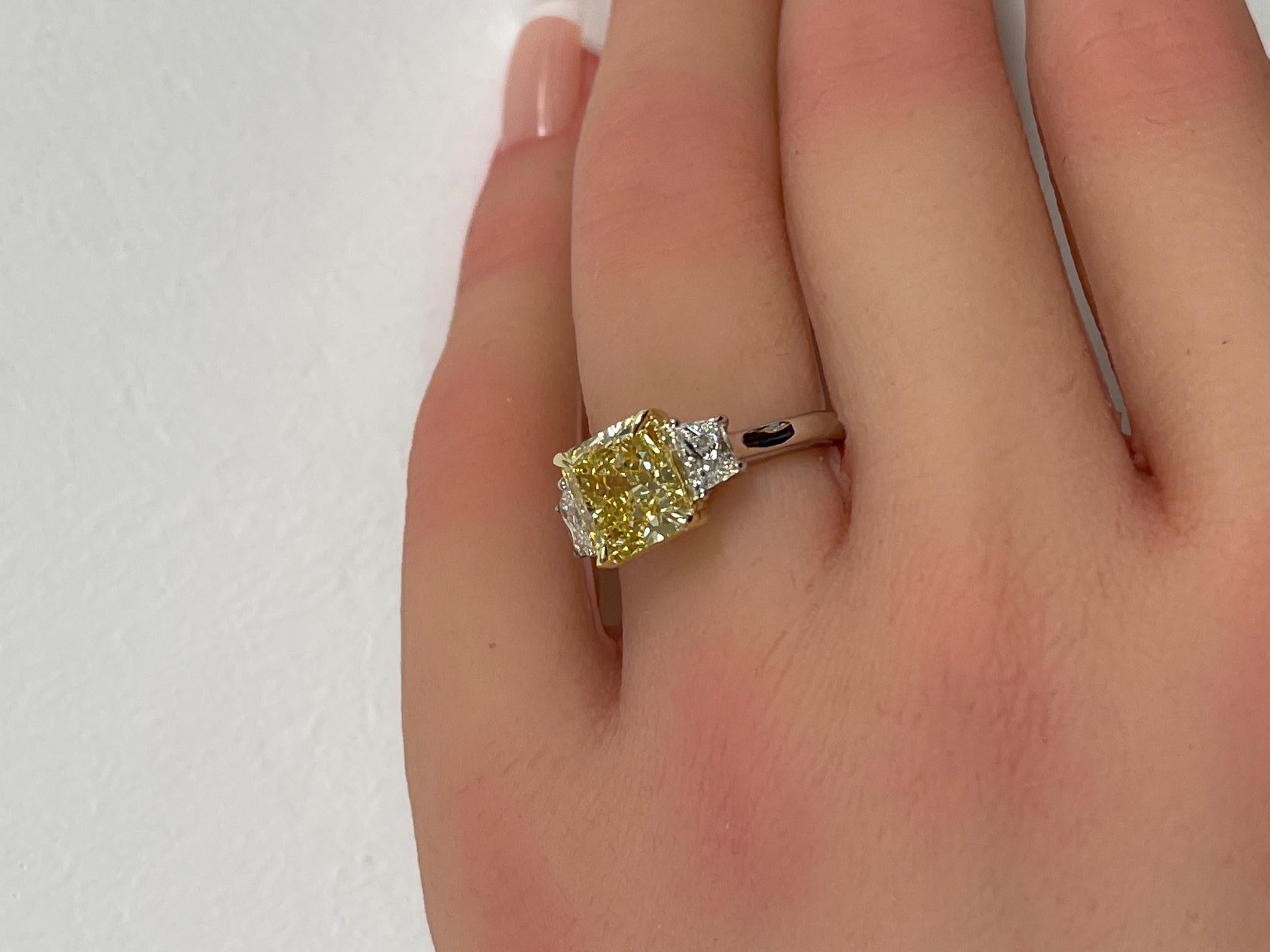 GIA Certified 3.00 Ct. Fancy Intense Yellow Radiant Cut Diamond Ring For Sale 5