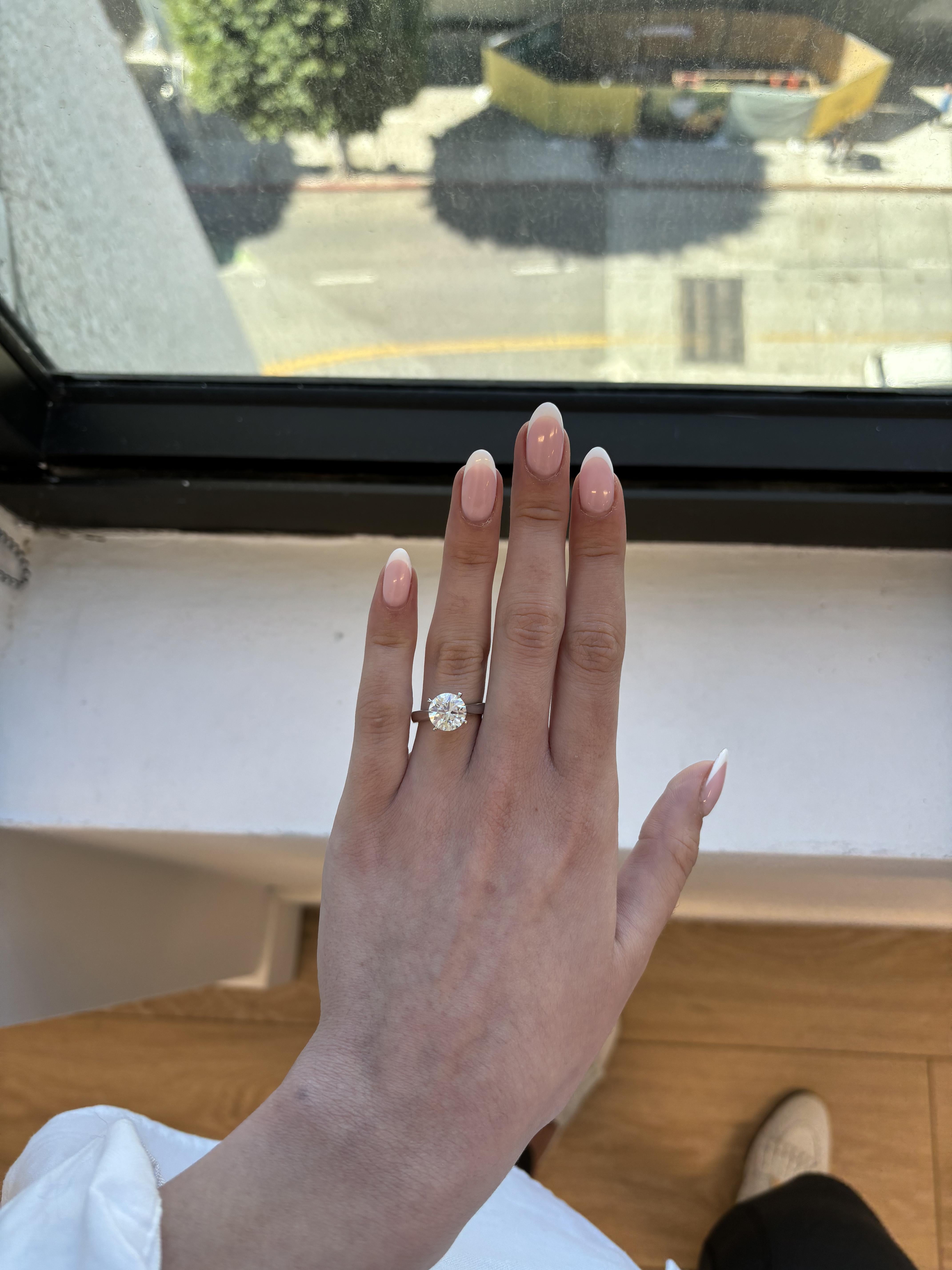 Classic solitaire diamond engagement ring double prong set.
3.00 carat round brilliant diamond. GIA certified I color grade and VS2 clarity grade. 14-karat white gold, 4.51 grams, current ring size 6.5.
Accommodated with an up to date digital