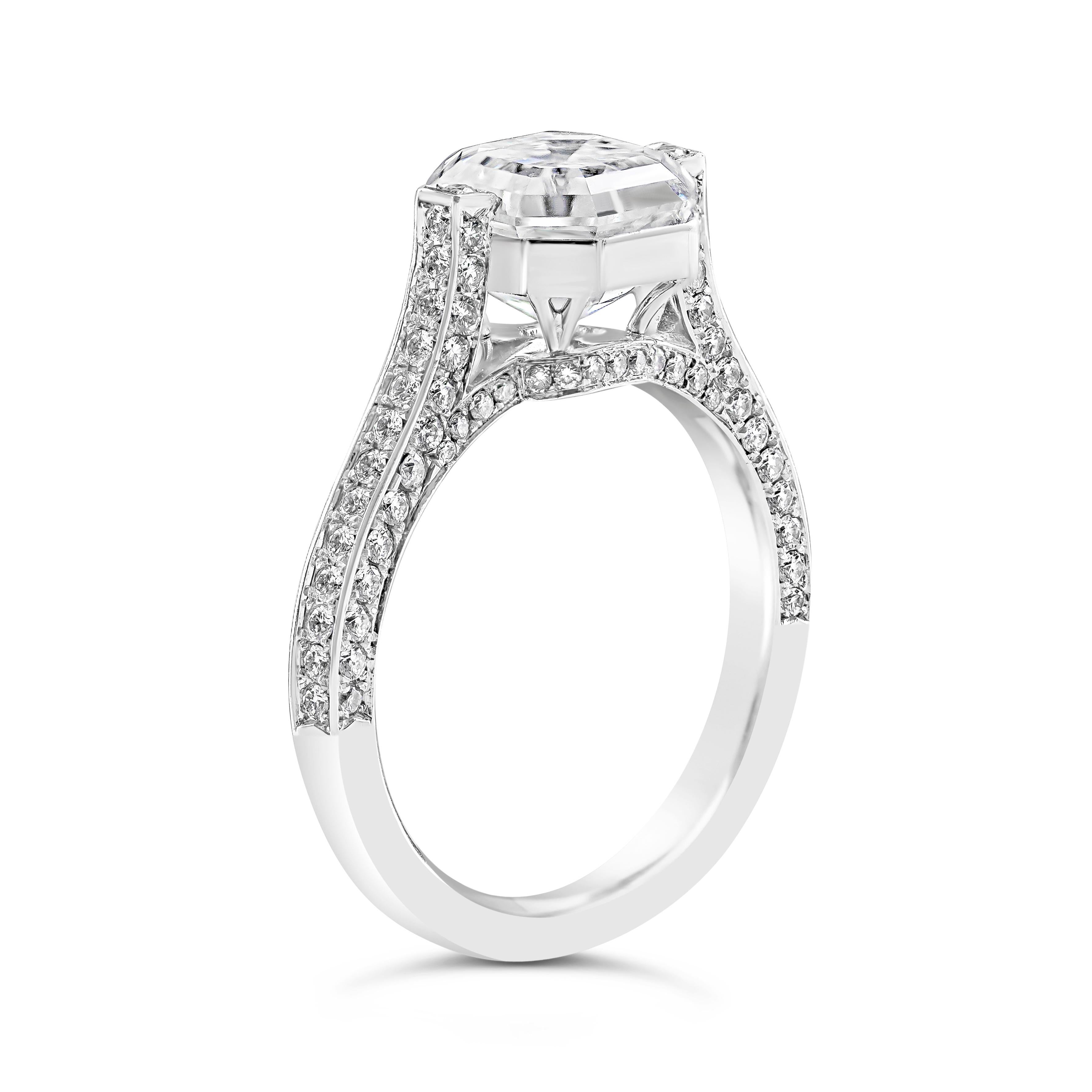 Showcases a 3.01 carats asscher cut diamond certified by GIA as G color and VS1 in clarity. Set in an invisible platinum basket underneath the diamond securely set on each side to give a floating effect. Set on a diamond encrusted shank on three