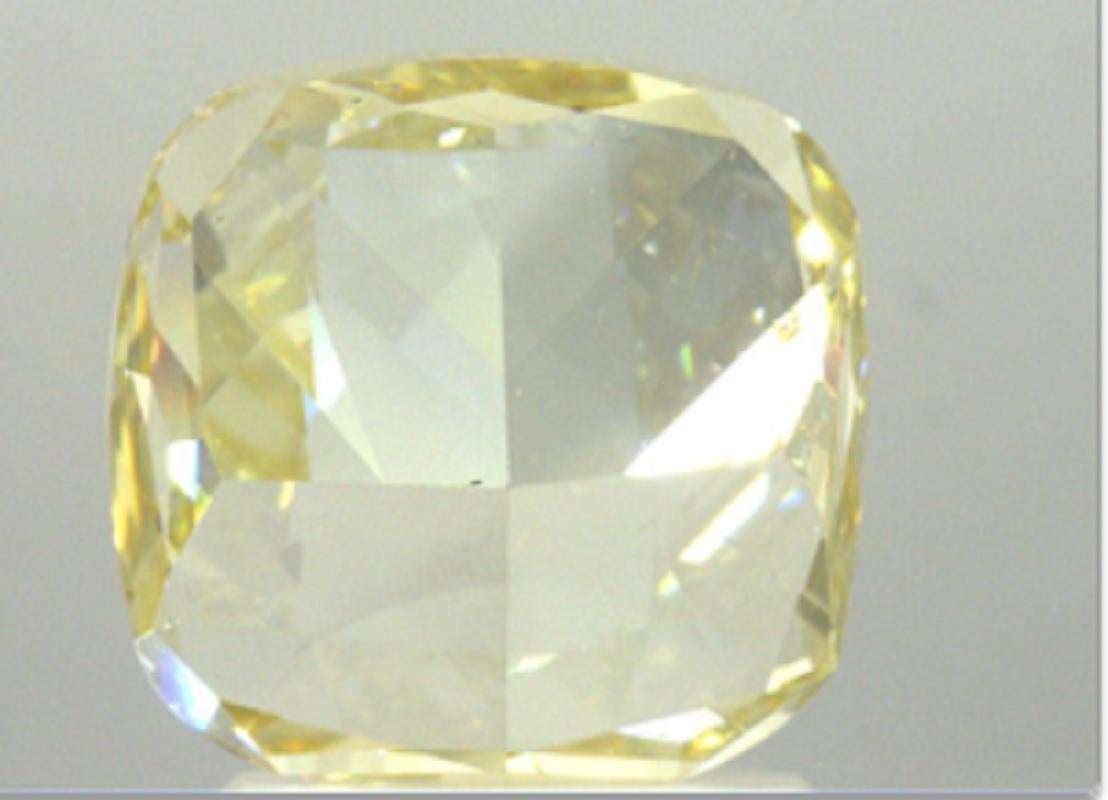 Contemporary GIA Certified 3.01 Carat Cushion Yellow Diamond For Sale