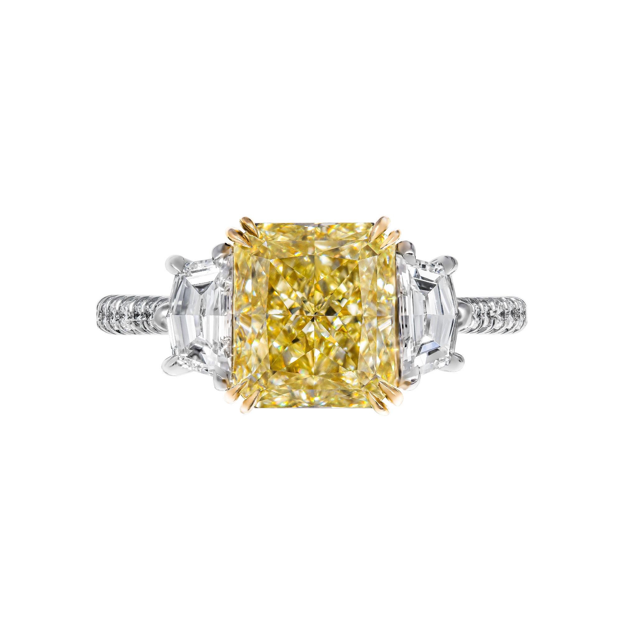 Mounted in handmade custom design setting featuring Platinum 950 & 22K Yellow Gold, diamonds on the shank and on a basket under each stone, a true piece of art

Setting features exceptional pave work, delicate yet sturdy, includes approximately