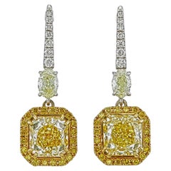 Boucles d'oreilles pendantes ornées d'un diamant jaune fantaisie de 3,01 carats certifié par le GIA