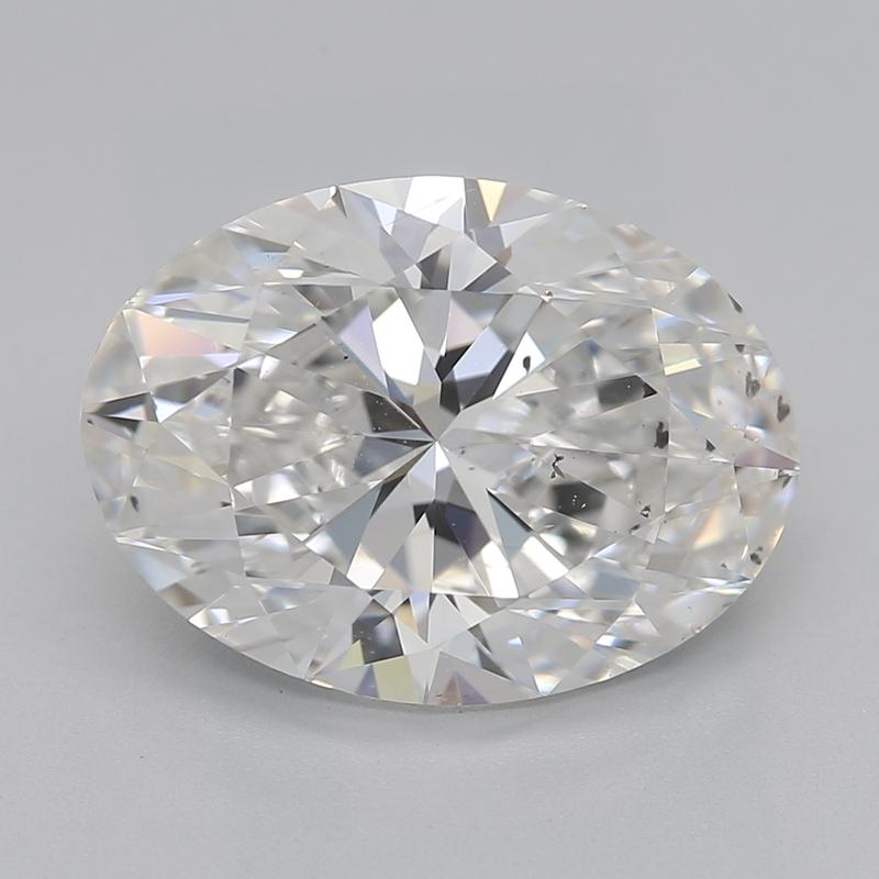 Dieser atemberaubende, in New York handgefertigte Diamantring besticht durch einen Mittelstein von außergewöhnlicher Schönheit, einen GIA-zertifizierten ovalen Diamanten von 3,01, bewertet mit G und SI1. Der in luxuriösem Gelbgold gefasste Ring