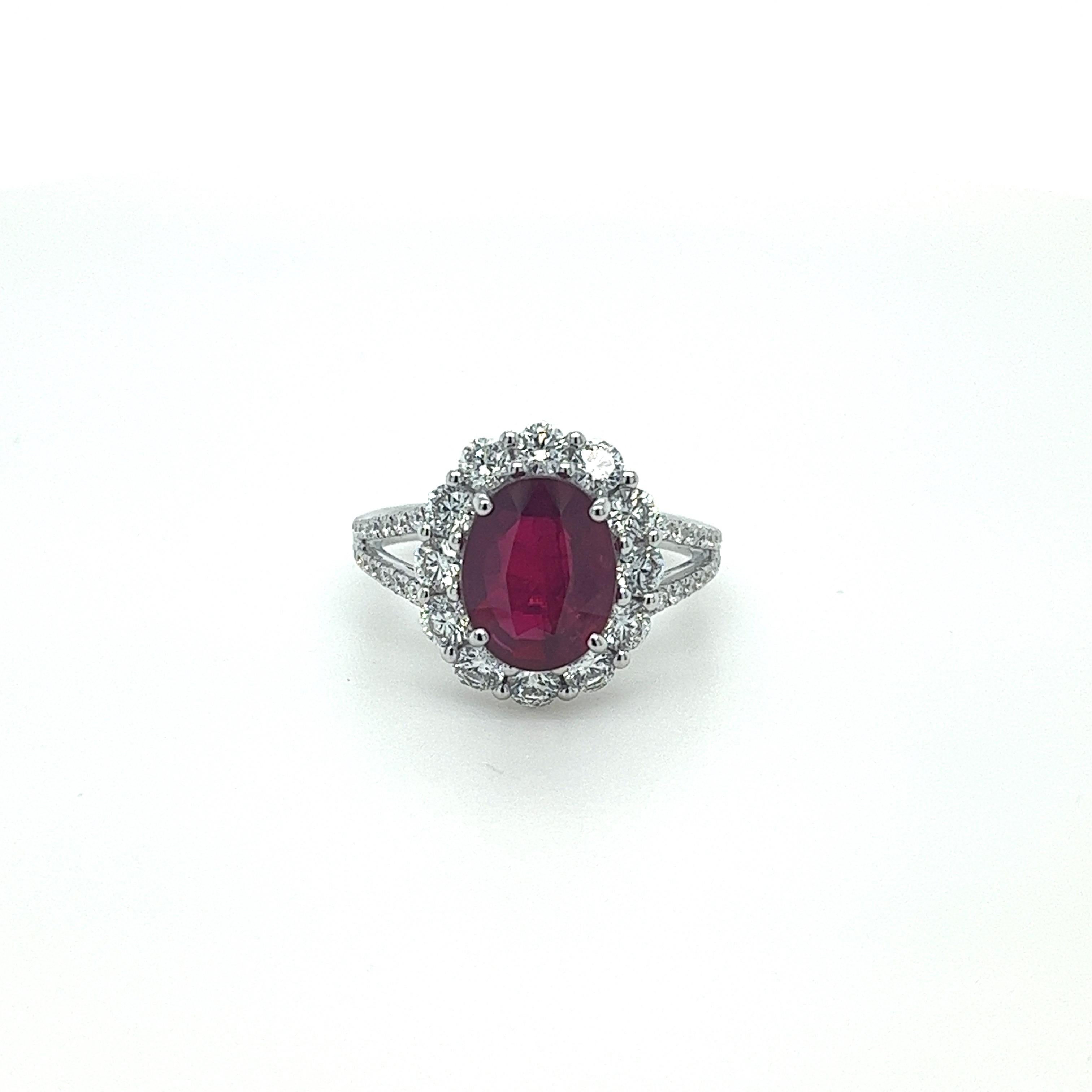 GIA Certified Oval Ruby weighing 3.01 carats
Measuring (9.89x7.80x3.91) mm
Diamonds weighing 1.20 carats
Diamond Quality: H-SI1
Set in 18k white gold ring
3.70 grams