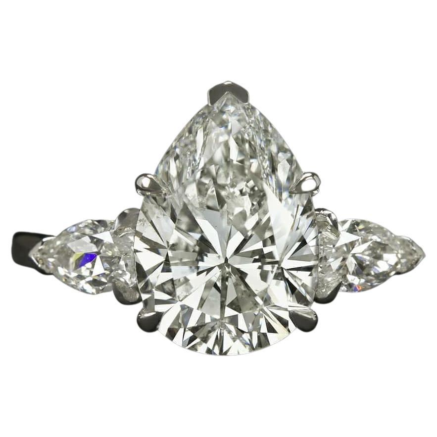 GIA Certified 3.01 Carat Pear Cut Three Stone Diamond Ring