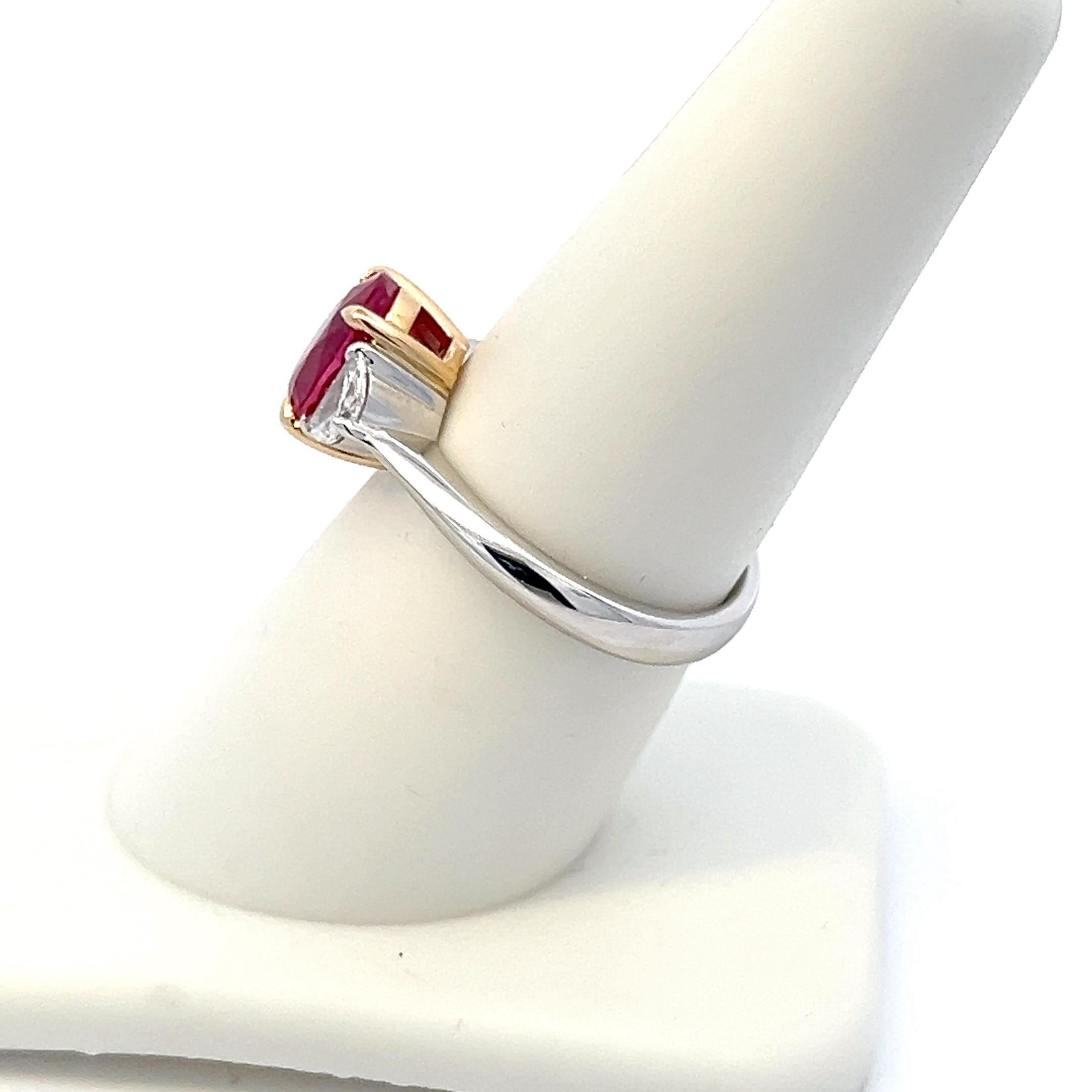 Introducing our Ruby and Diamond Three Stone Ring—a captivating expression of love, elegance, and enduring beauty. Crafted in the finest 18K white gold, this exquisite piece features a thoughtful design that perfectly balances classic charm with