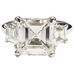 GIA Certified 3.01 Carat Square Emerald Cut Diamond Platinum Three-Stone Ring