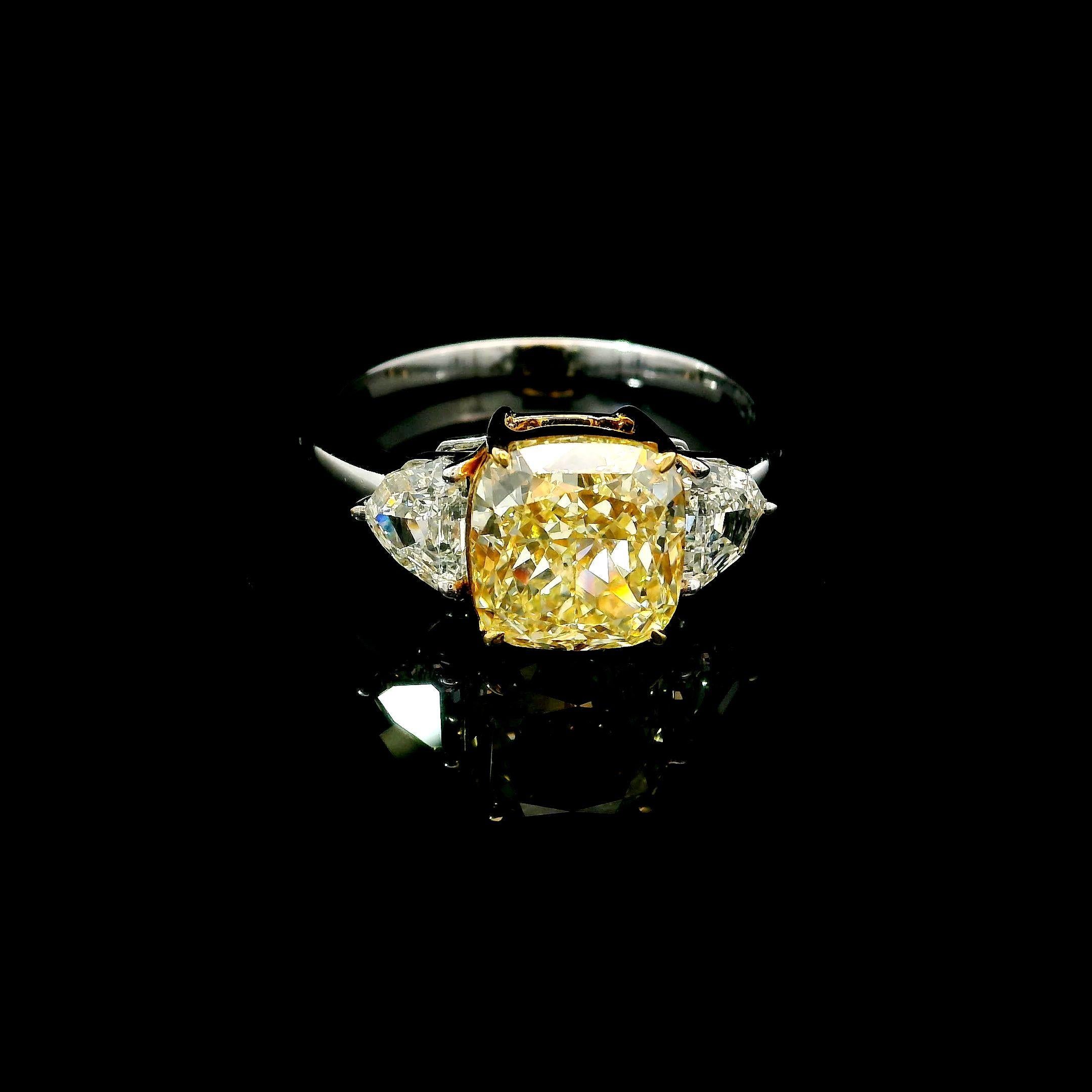 18kt white gold ring with diamonds
  
  Gold colour & karat: White gold 18kt
  Weight: 3.98 grams
  
  Set with-
  Stone type: Diamonds
  Shape: Cushion
  Carat: 3.01 ct
  Colour: Y-Z
  Clarity: VS1
  
  Surrounding Stones: Diamonds
1) Caddilac