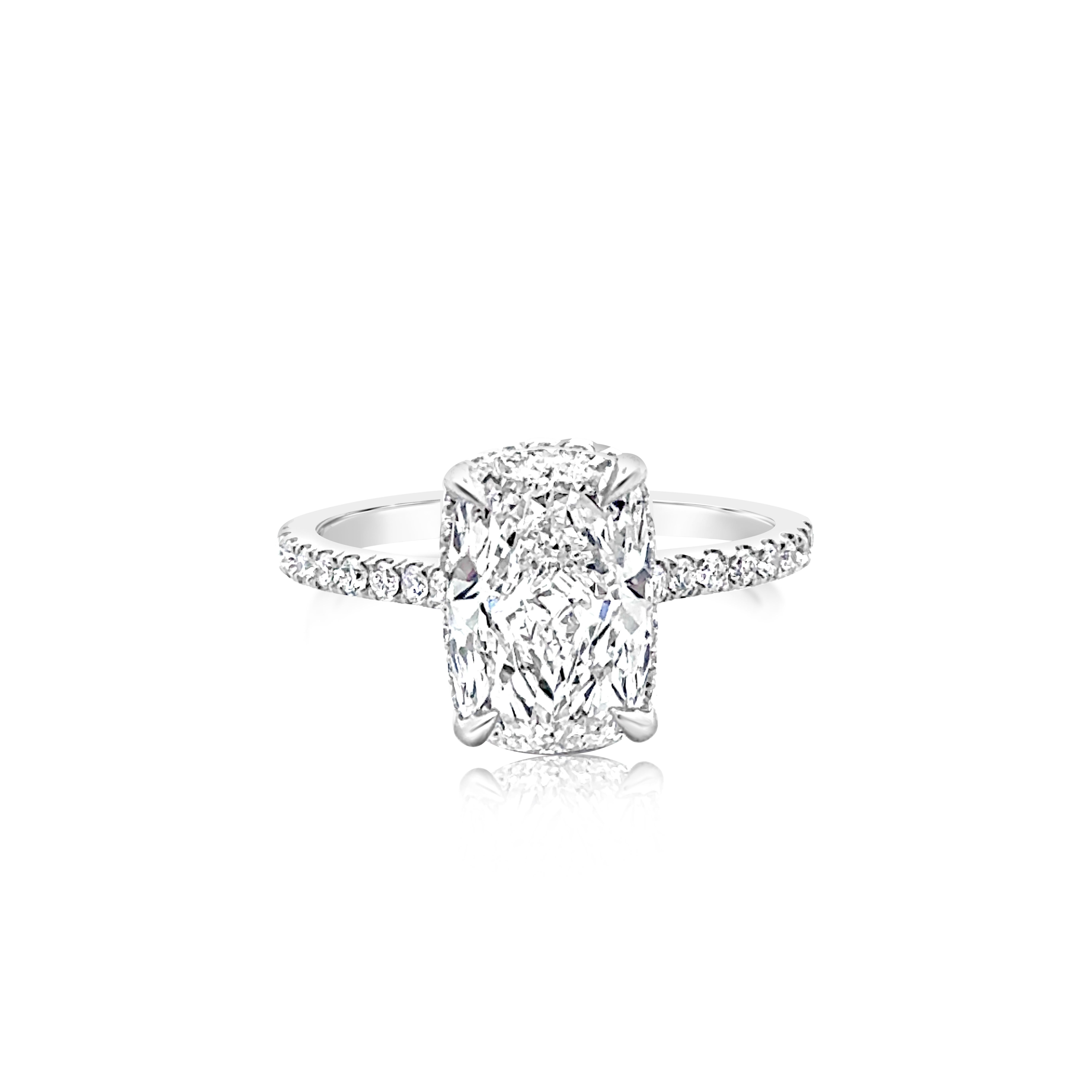 A gorgeous engagement ring, showcasing a 3.01 carats elongated cushion cut diamond certified by GIA as H color and VS1 clarity, set on a classic four prong setting. Accented by round brilliant cut diamonds weighing 0.45 carat total, set on a