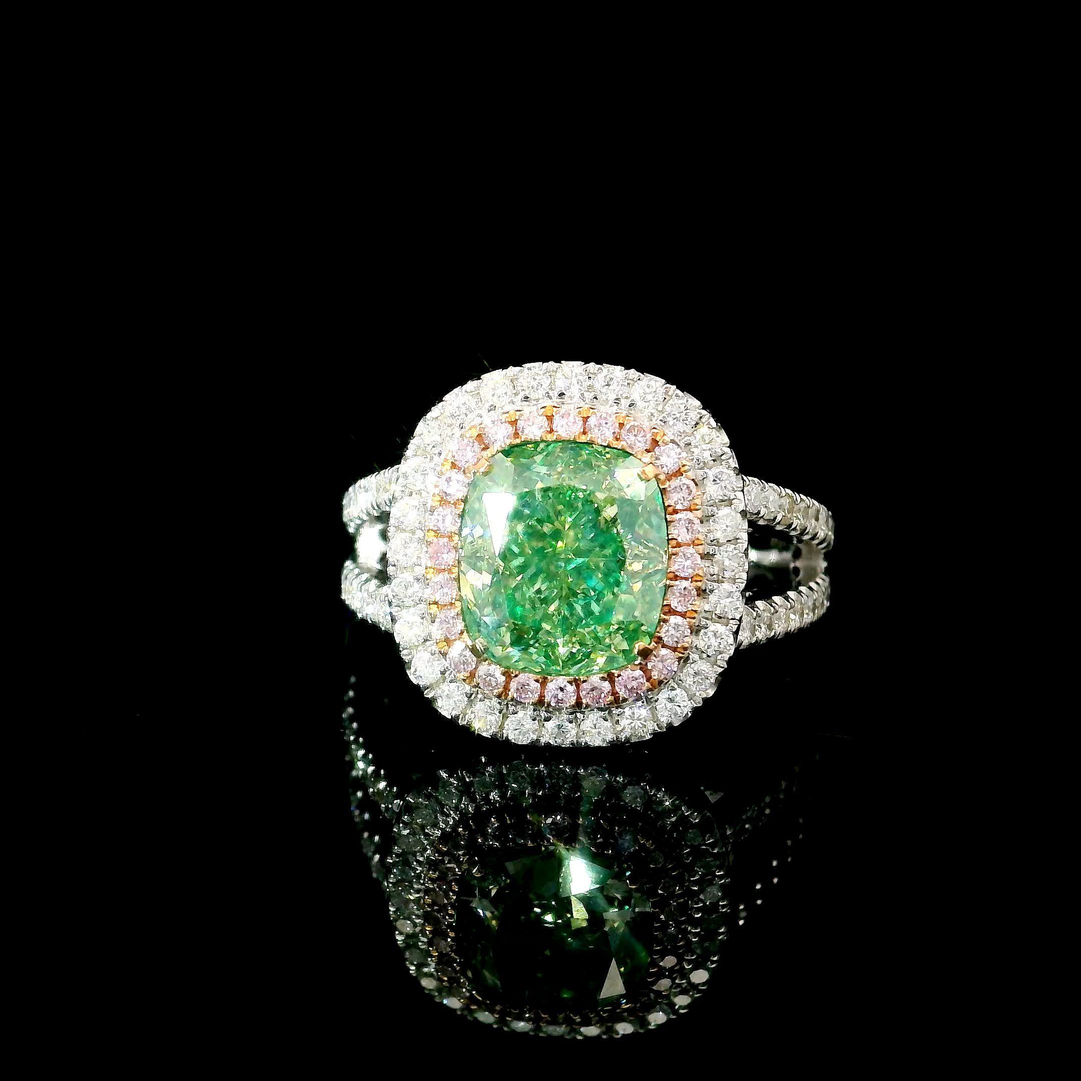 18kt white gold ring with diamonds
  
  Gold colour & karat: White gold 18kt
  Weight: 6.32 grams
  
  Set with-
  Stone type: Diamonds
  Shape: Cushion
  Carat: 3.01
  Colour: Fancy Light Brownish Greenish Yellow 
  Clarity: SI1
  
  Surrounding