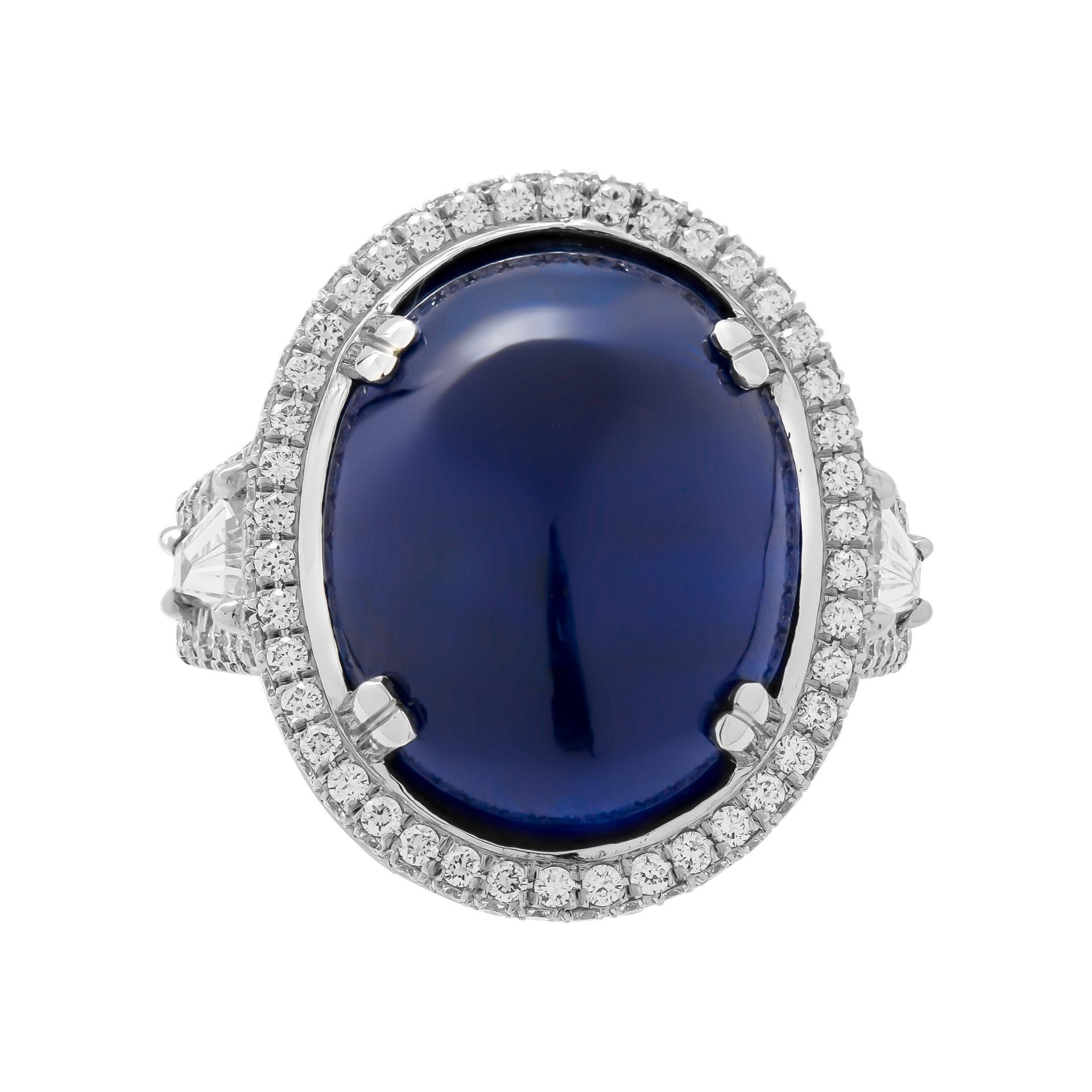 GIA Certified 30.18 Carat Oval Sapphire Cabochon Diamond Cocktail Ring
Crafted in Platinum
Size 6 (sizable)
Center stone: 30.18ct Blue Sapphire Double Cabochon (treatment: heated) GIA#6224222724
Side stones Baguettes: 1.07 total carat weight
Small