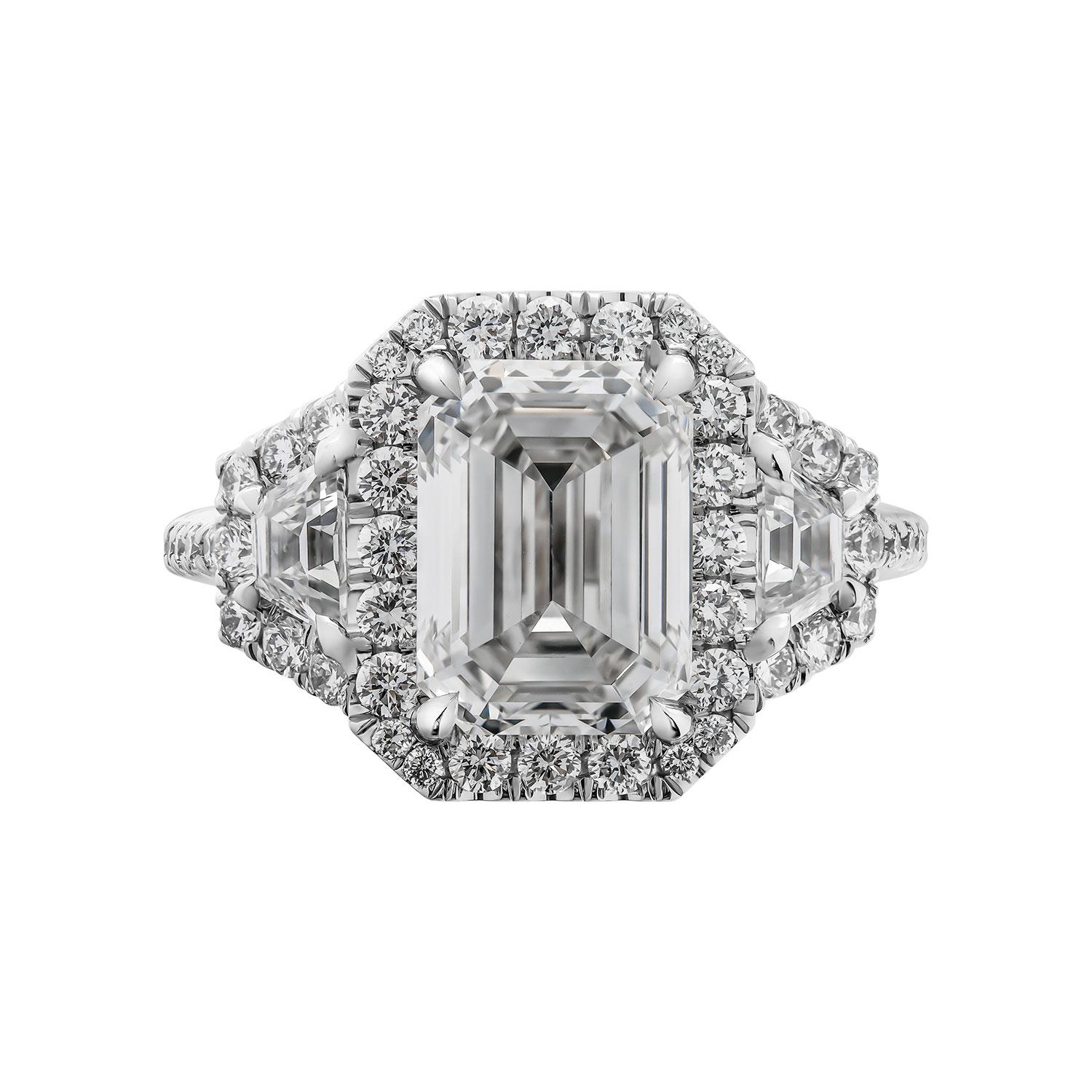 Mounted in handmade custom design setting featuring Platinum 950 , diamonds on the shank and around each stone, a true piece of art

Setting features exceptional pave work, delicate yet sturdy, includes approximately 1.08ct of small full brilliant