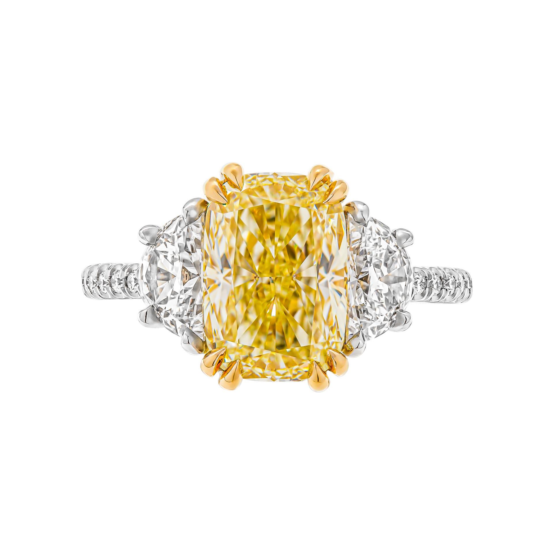 3 stone ring in 18K Yellow & Platinum 

Cathedral diamond shank; diamond bridge; yellow diamond center wire 

3.01ct U-V VVS2 Cushion Shape Diamond GIA#2225480820 (looks like a fancy yellow diamond!)

0.82ct E color VS clarity Half moon diamonds