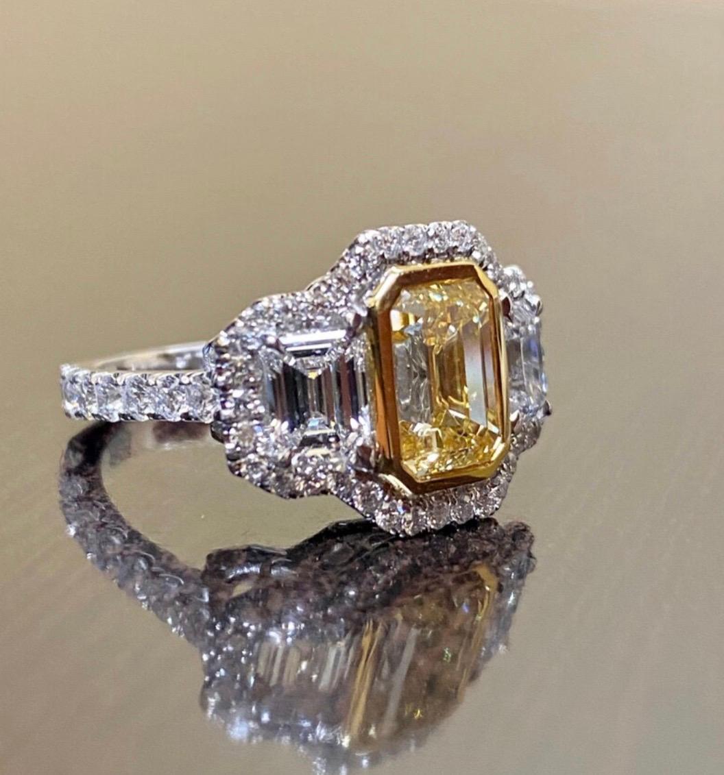GIA Certified 3.02 Carat Emerald Cut Fancy Yellow Diamond Engagement Ring For Sale 3