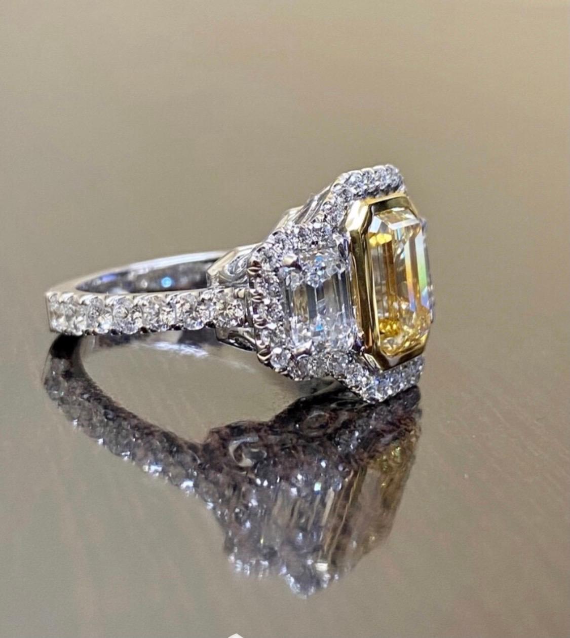 GIA Certified 3.02 Carat Emerald Cut Fancy Yellow Diamond Engagement Ring For Sale 5