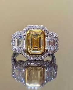 GIA Certified 3.02 Carat Emerald Cut Fancy Yellow Diamond Engagement Ring