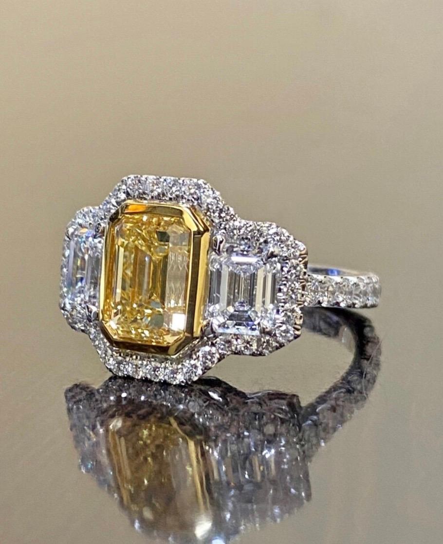 Art Deco GIA Certified 3.02 Carat Emerald Cut Fancy Yellow Diamond Engagement Ring For Sale