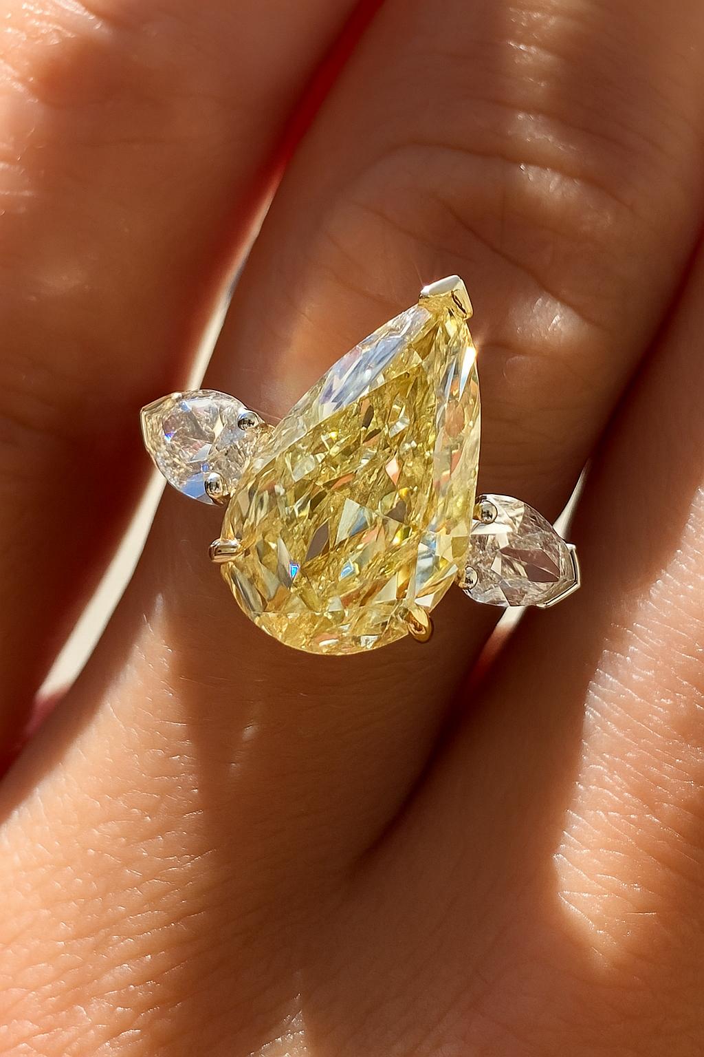 Contemporary GIA Certified 3.02 Carat Fancy Intense Yellow Pear Diamond Ring For Sale