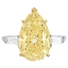 GIA DOR Certified 3.45 Carat Pear Cut Diamond Fancy Yellow Three Stone Ring
