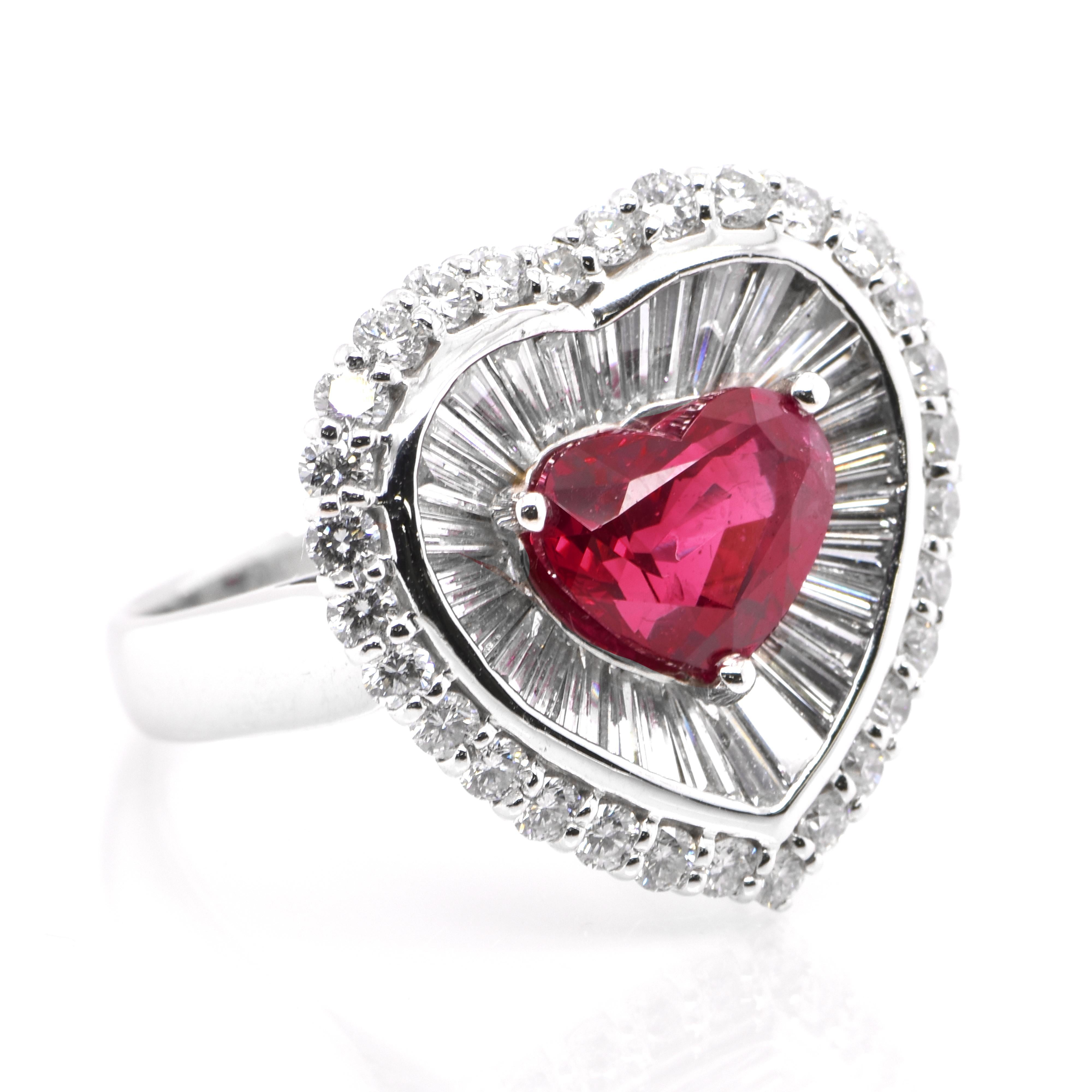 A beautiful Cocktail ring set in Platinum featuring a GIA Certified 3.02 Carat Natural Burmese Ruby and 2.21 Carats of Diamond Accents. Rubies are referred to as 