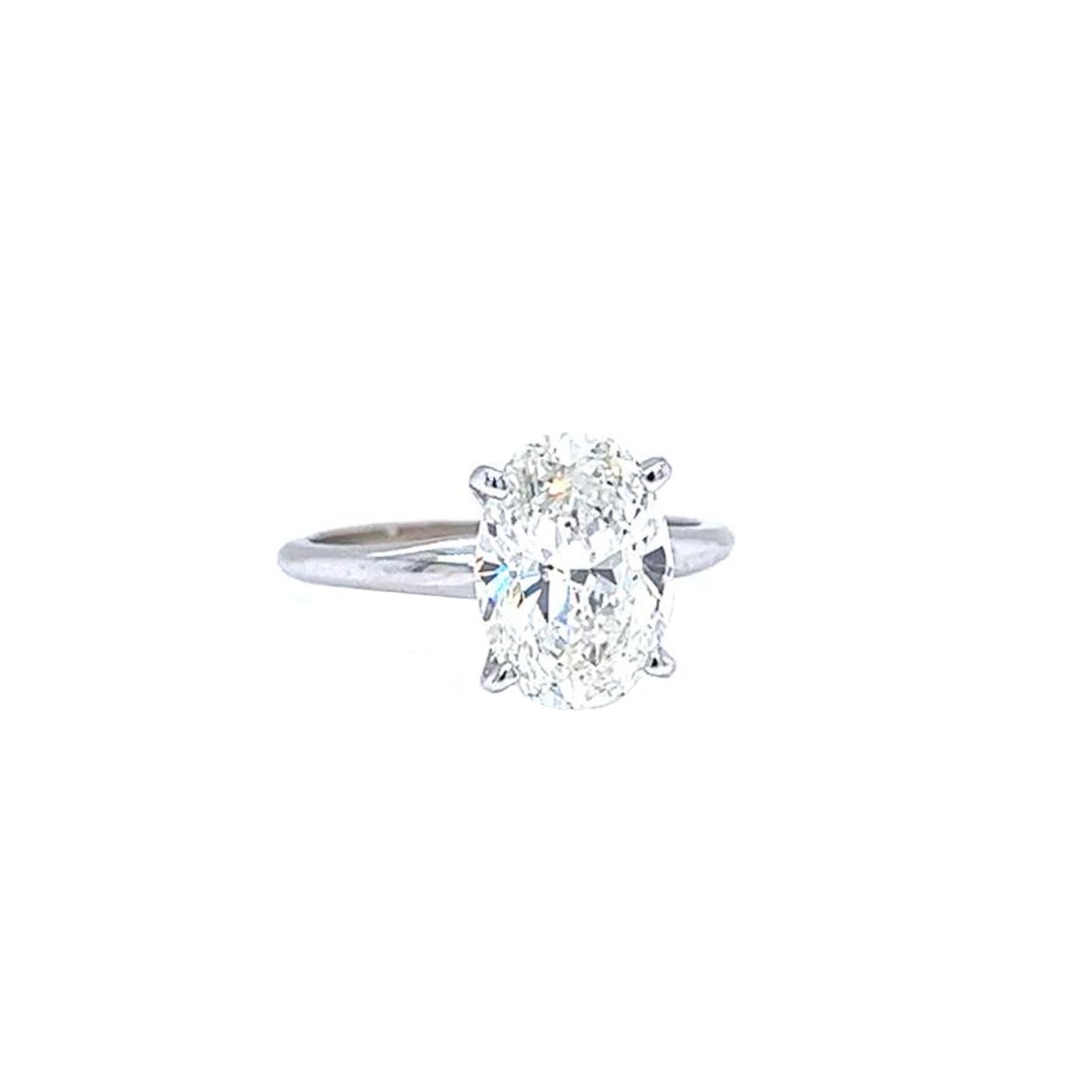 GIA Certified 3.02 Carat Oval Cut Diamond Tiffany Style 14K White Gold Ring In Good Condition For Sale In Aventura, FL