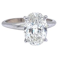 Bague en or blanc 14 carats certifiée GIA et ornée d'un diamant ovale de 3,02 carats de style Tiffany