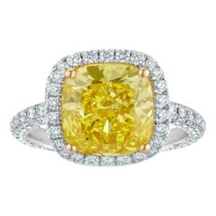 Anello di fidanzamento in platino con diamante giallo da 3.02 carati certificato GIA