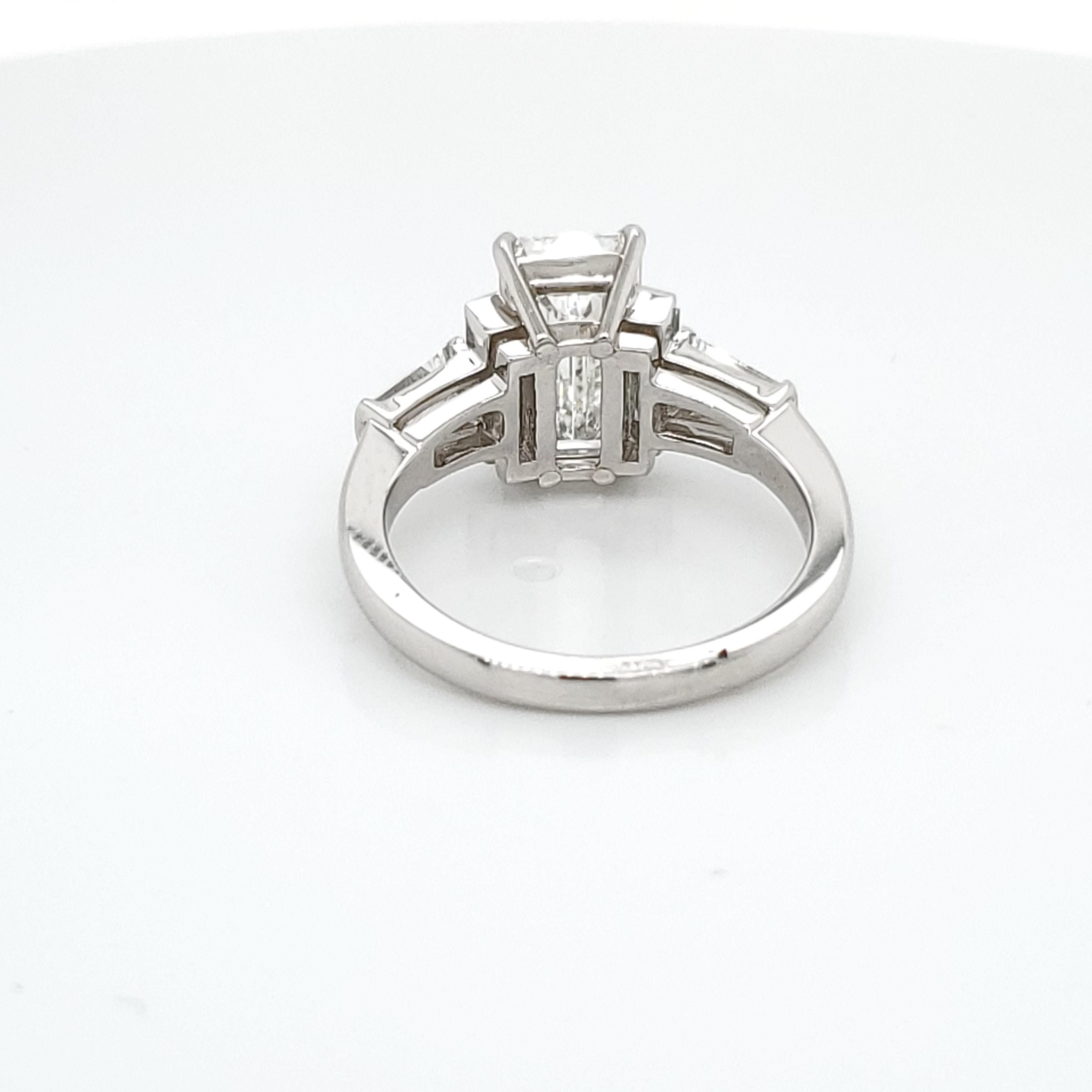 5 stone emerald cut diamond ring