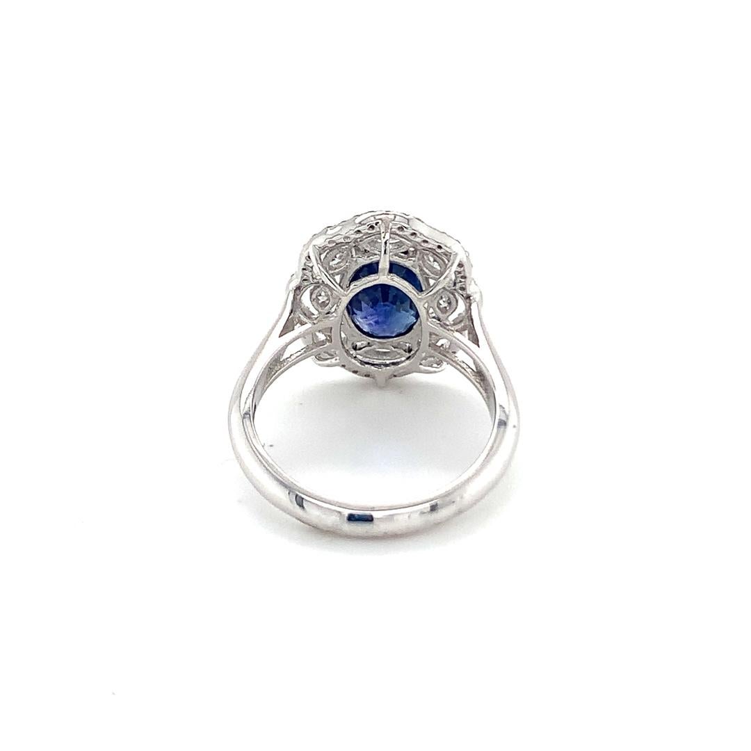 Women's GIA Certified 3.03 Carat Natural Blue Sapphire and Diamond Ring For Sale