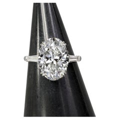 GIA Certified 3.03 Carat Oval Cut Diamond Three Stone Ring VVS1