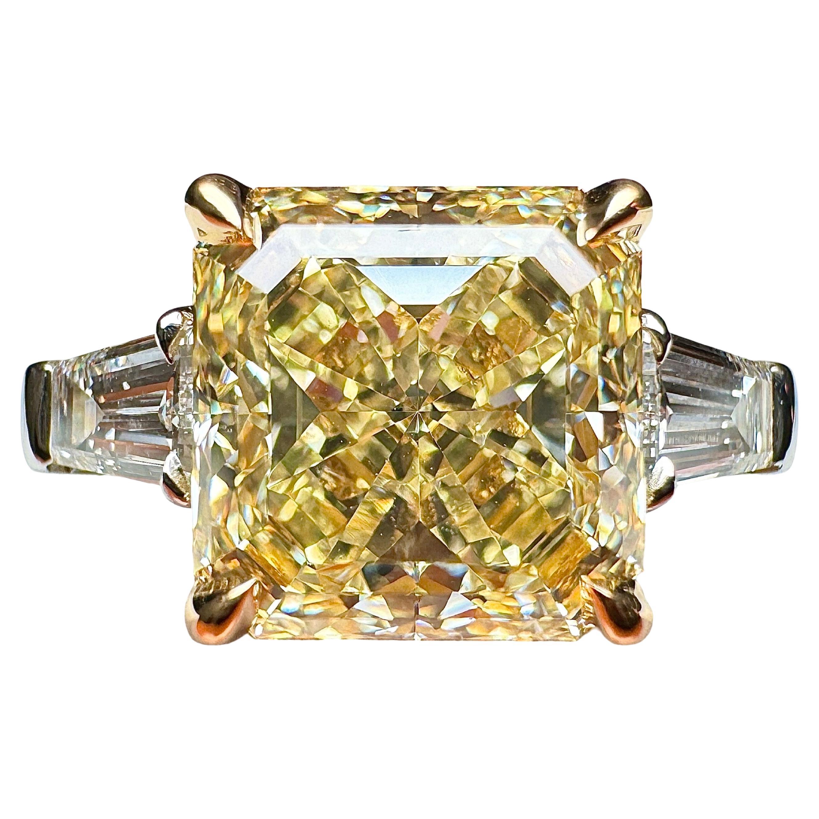 GIA Certified 3.03 Carat Radiant Cut Yellow Diamond 3 Stone Ring For Sale