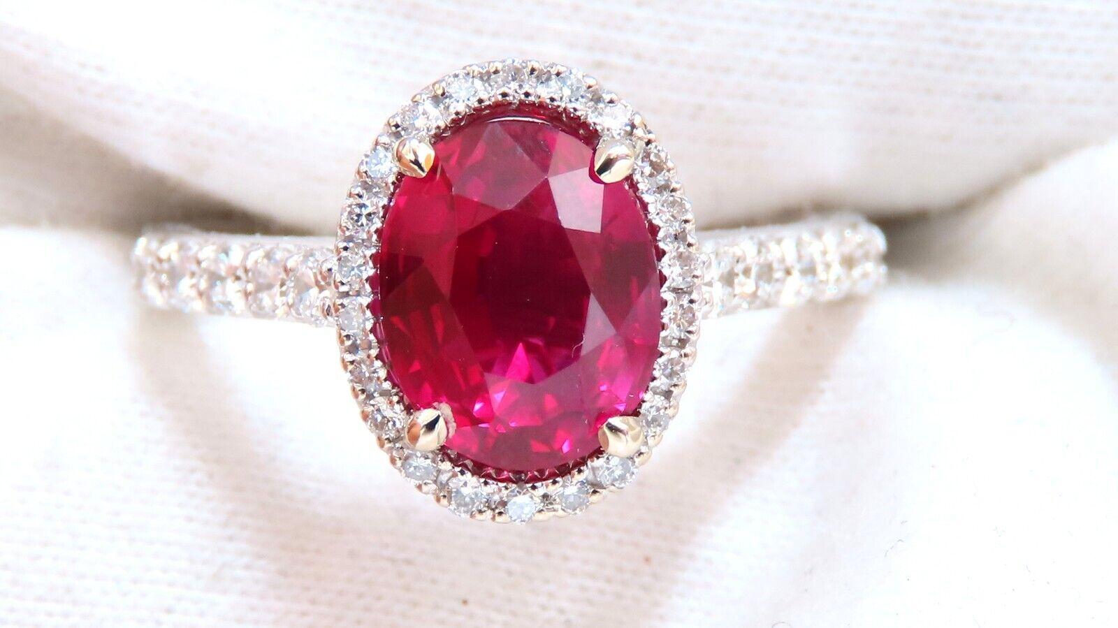 GIA certified oval shape ruby ring.

No heat, oval full cut & clean clairty

8.9x7.1mm.

GIA certificate to accompany.

.50ct natural side round diamonds.

F-G-color, vs2-clarity

18 karat white gold

Depth of ring 7.3 mm

Deck of ring: 12 x