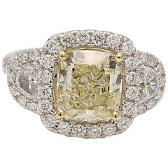 GIA Certified 3.04 Carat Yellow Cushion Cut Halo Diamond Engagement Ring GIA Certified 3.04 Carat Yellow Cushion Cut Halo Diamond Engagement Ring