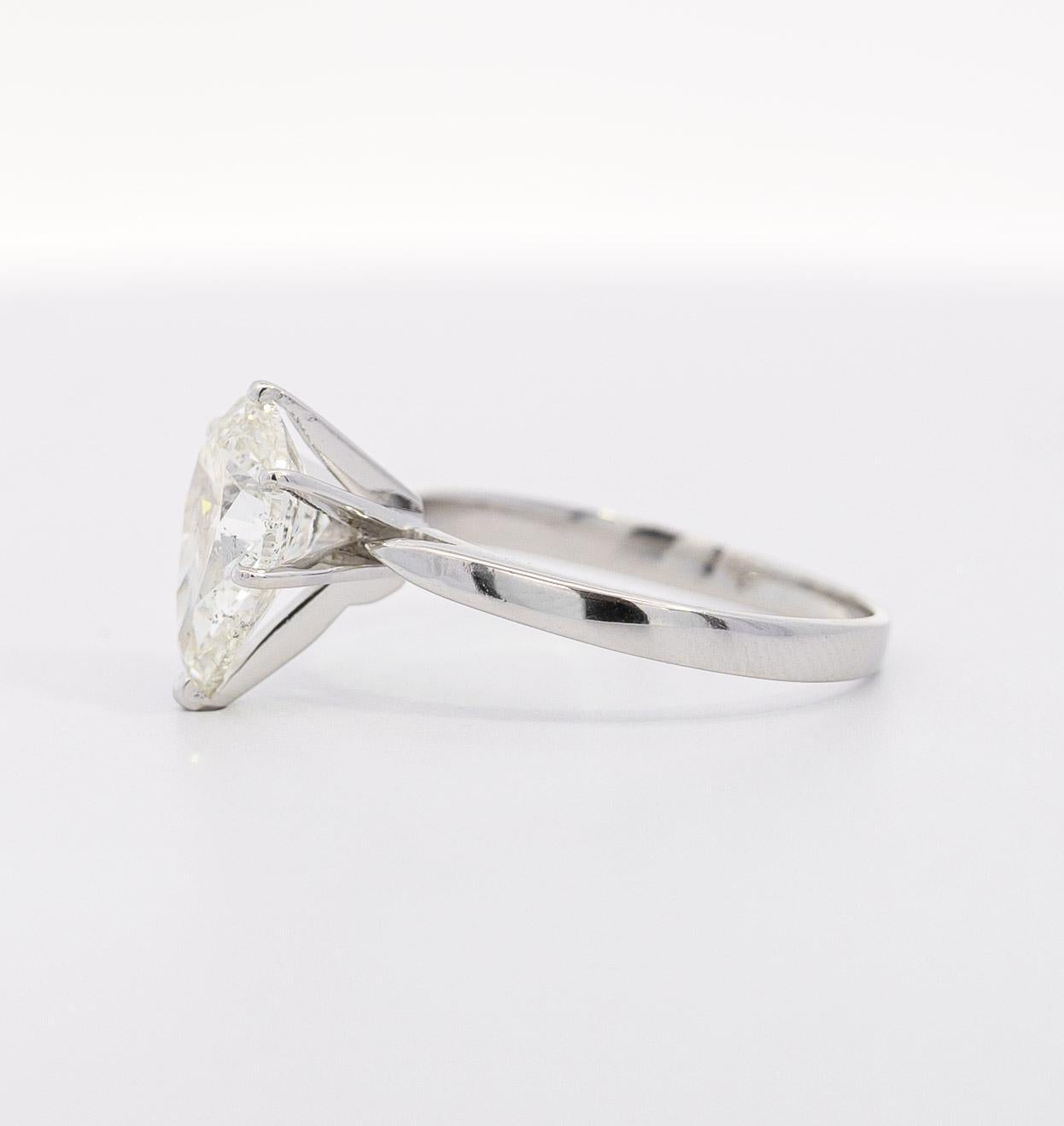 GIA Certified 3.40 I/SI2 Pear Cut Diamond Solitaire 18K White Gold Ring In New Condition For Sale In Miami, FL