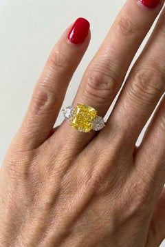 GIA Certified 3.05 Carat Fancy Intense Yellow Diamond Platinum Ring