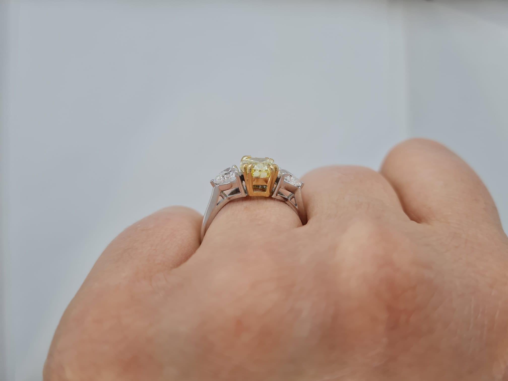 Modern GIA Certified 2 Carat Internally Flawless Fancy Ligh Yellow Oval Diamond Ring